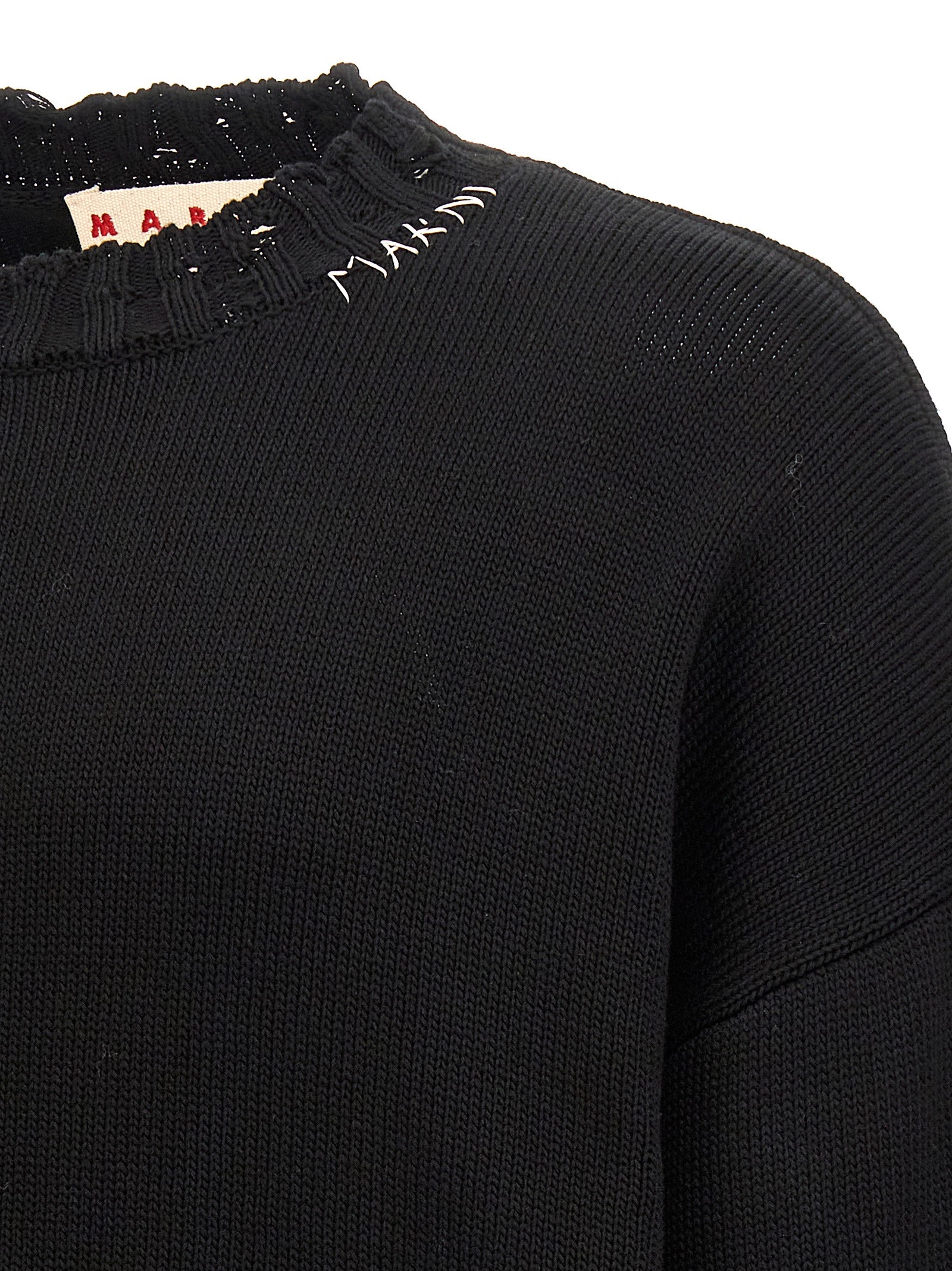 Elevate your style with the Marni Black Cotton Cardigan, a luxurious blend of comfort and sophistication, crafted in Italy for the discerning individual.
