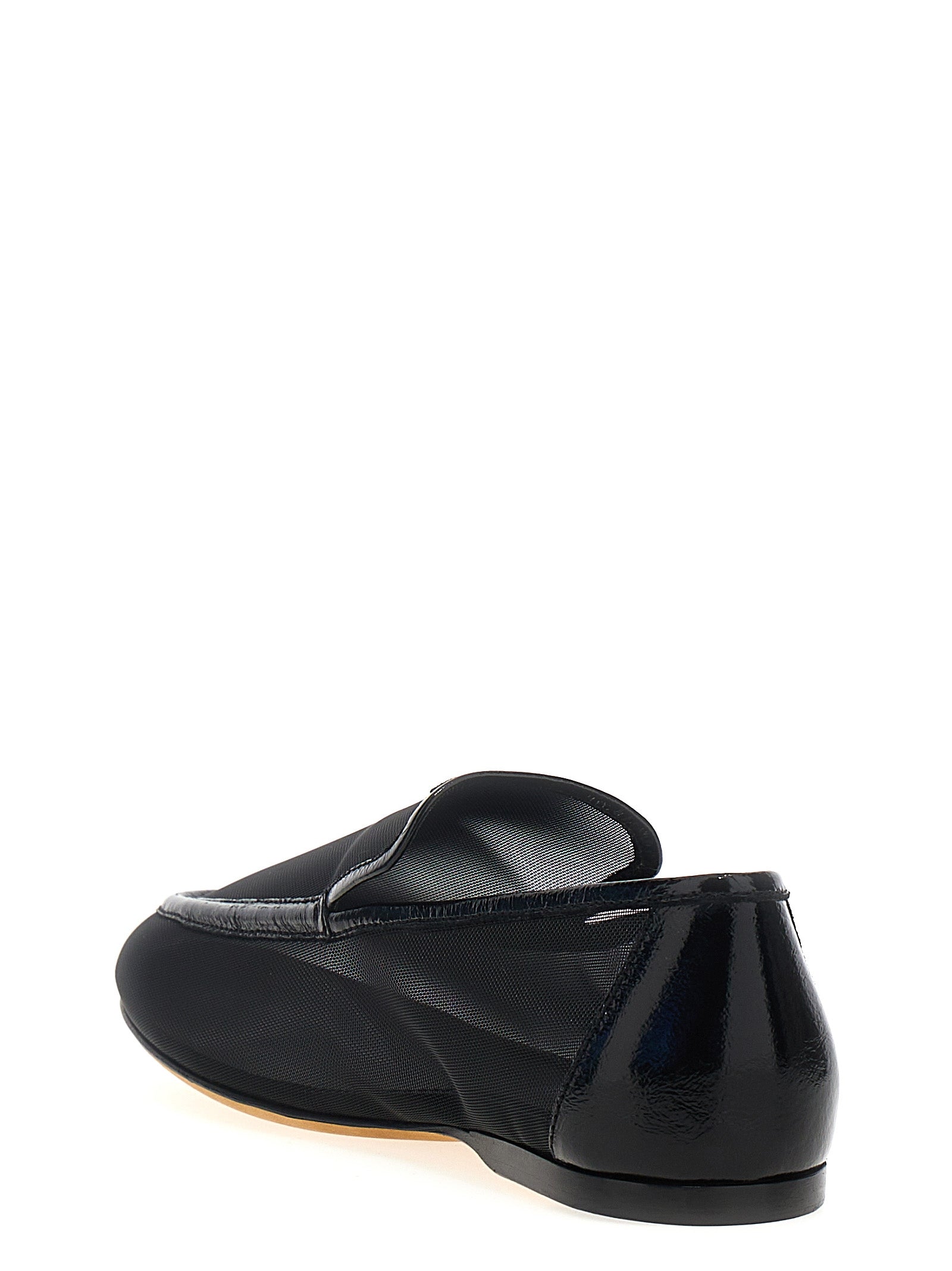 Indulge in Khaite's exquisite black slip-on loafers, where artisanal craftsmanship meets luxurious materials for a timeless statement of elegance and sophistication.