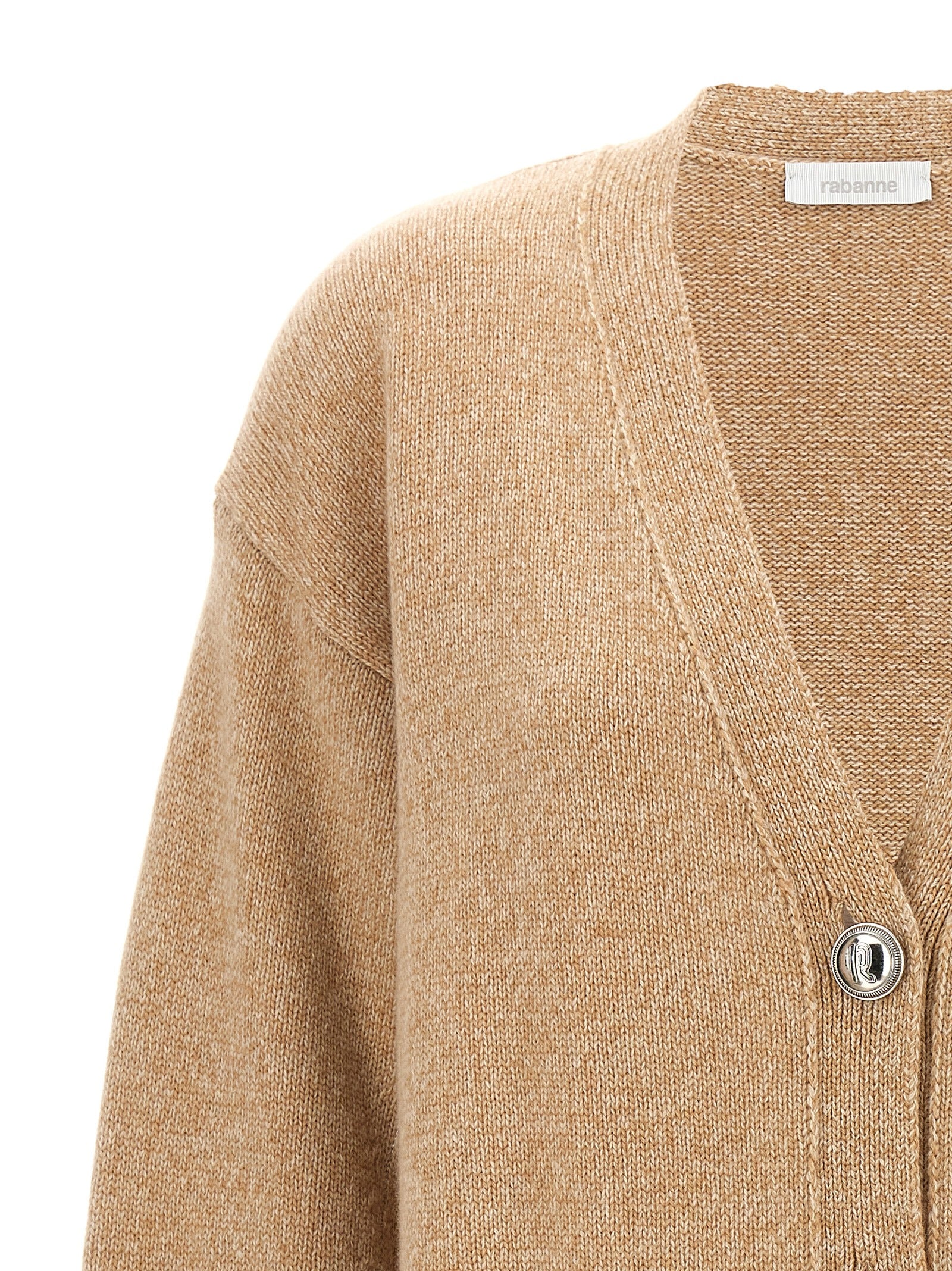 Elevate your wardrobe with the PACO RABANNE Beige Wool Cardigan, a luxurious blend of wool and cashmere, embodying timeless elegance and artisanal craftsmanship.