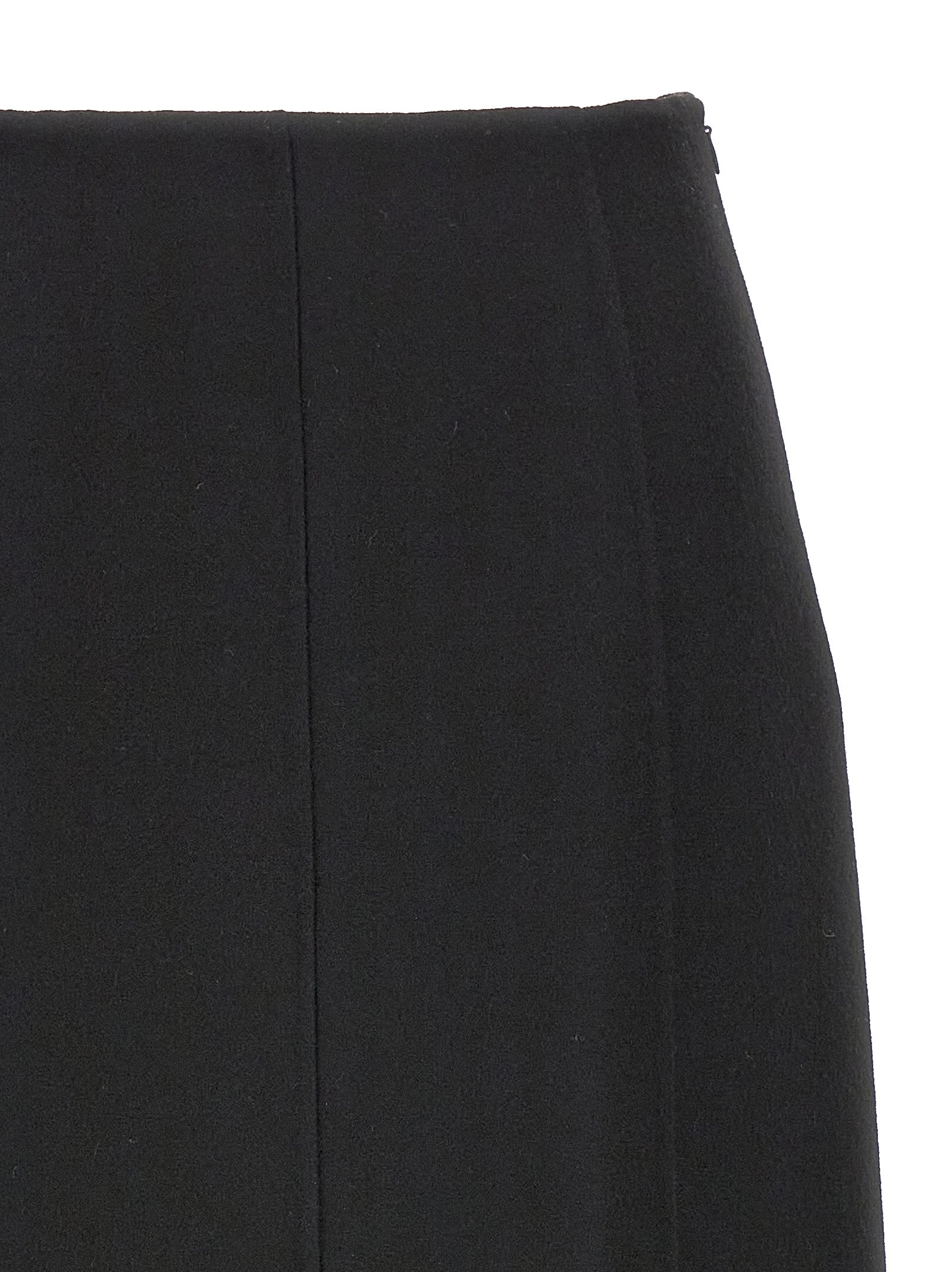 Elevate your style with the Ermanno Scervino Black Virgin Wool Mini Skirt, a timeless piece crafted in Italy from luxurious virgin wool, embodying elegance and sophistication.
