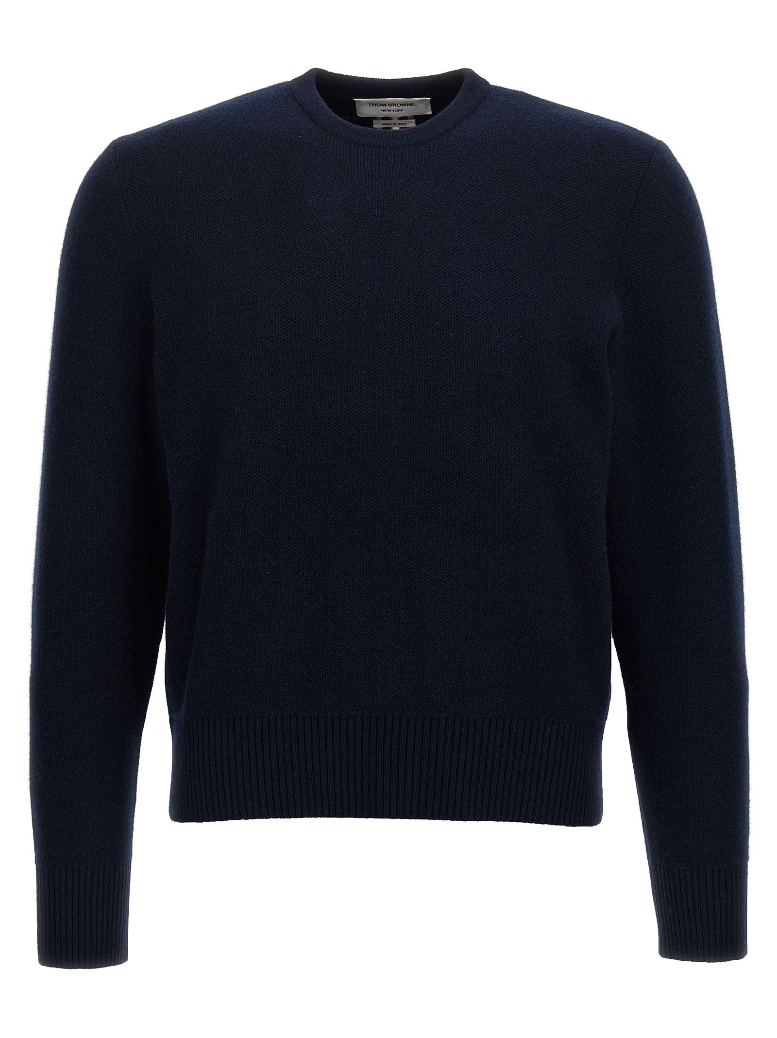 Discover the Thom Browne Blue Virgin Wool Cardigan, a masterpiece of luxurious craftsmanship and timeless elegance, perfect for those who embody refined style and sophistication.