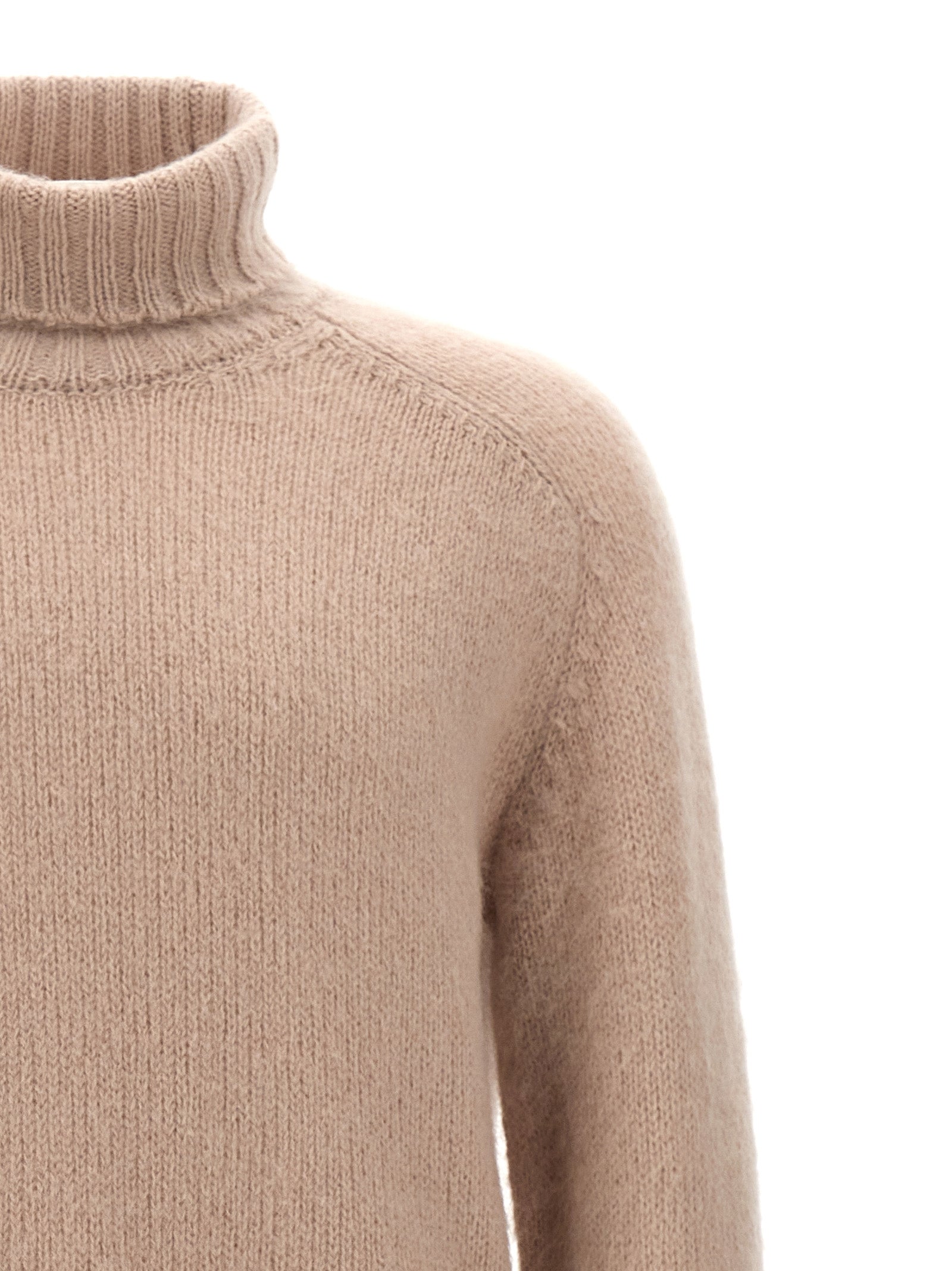 Experience the exquisite Tom Ford Multicolor Wool Cardigan, a luxurious blend of wool and mohair, embodying timeless elegance and sophisticated craftsmanship for the discerning individual.
