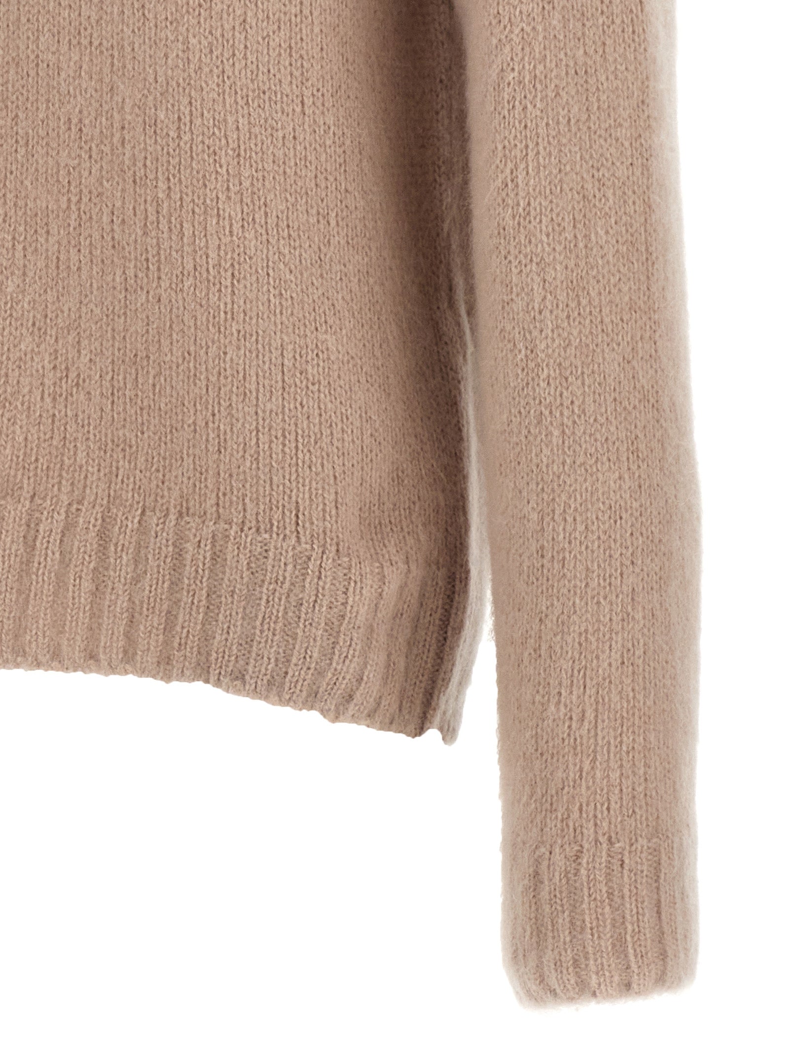 Indulge in the Tom Ford Multicolor Wool Cardigan, a luxurious blend of wool and mohair, embodying timeless elegance and sophisticated comfort for the discerning individual.