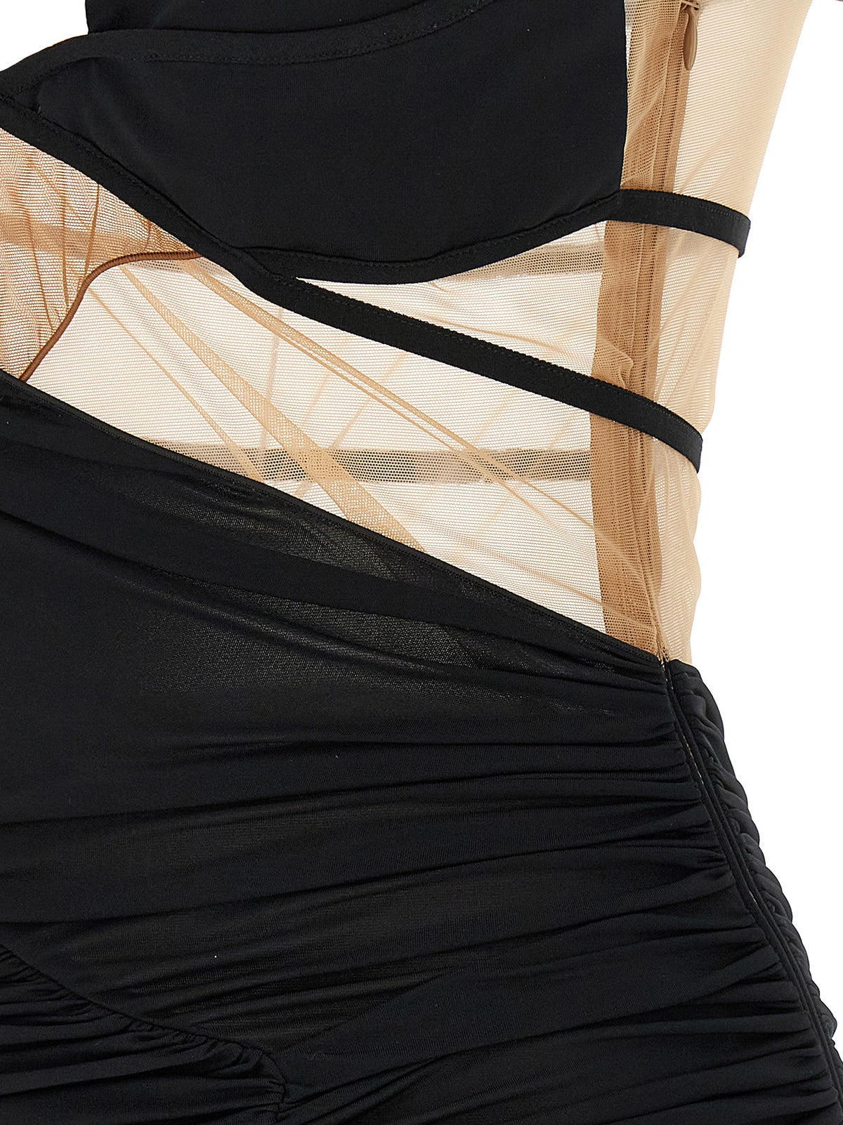 Indulge in the Nensi Dojaka Black Viscose Short Dress, where exquisite craftsmanship meets sultry elegance, perfect for those who embody sophistication and allure.