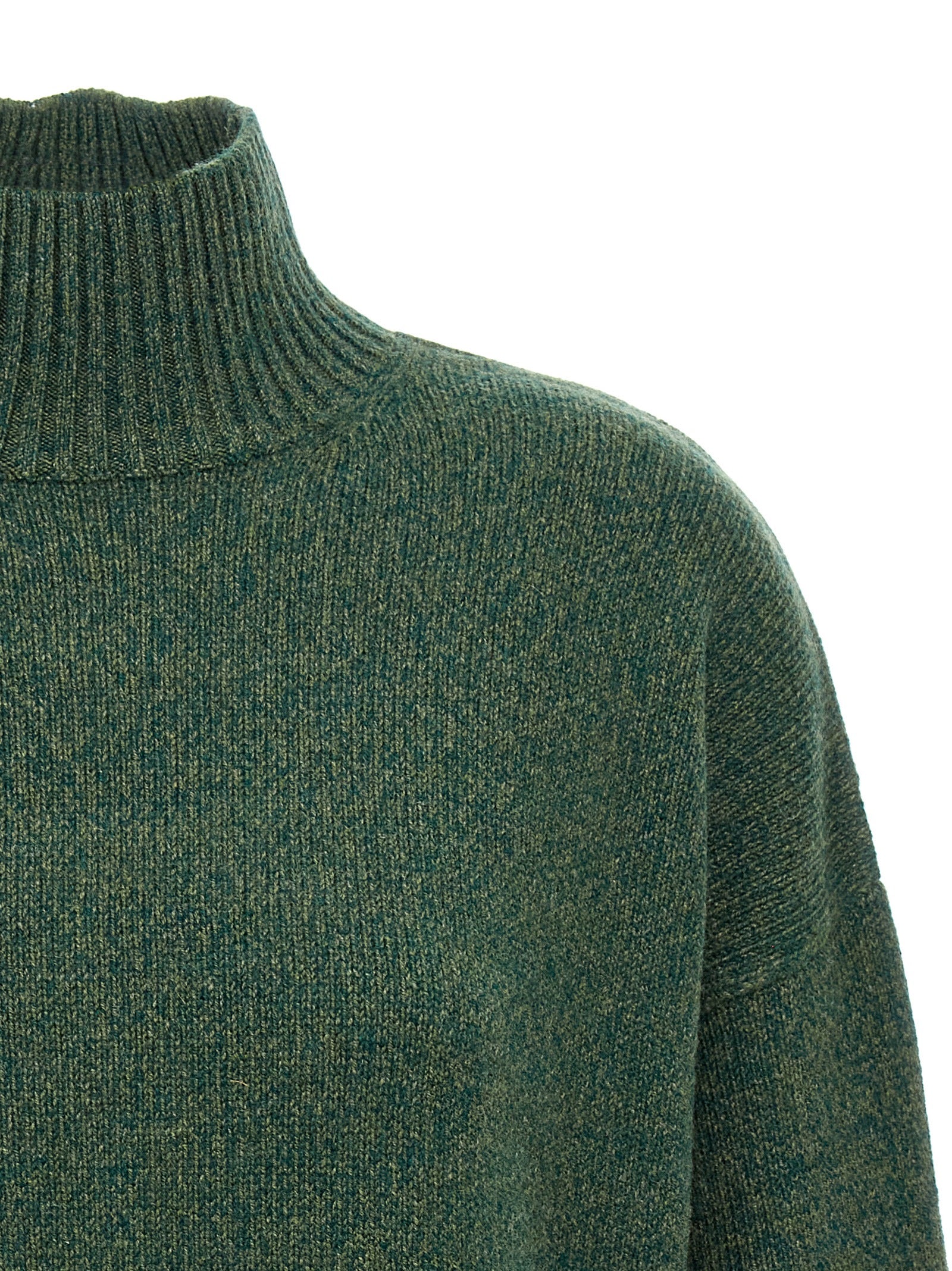 Indulge in the Victoria Beckham Bicolor Wool Cardigan, a luxurious blend of wool and cashmere, embodying timeless elegance and sophisticated versatility for discerning tastes.