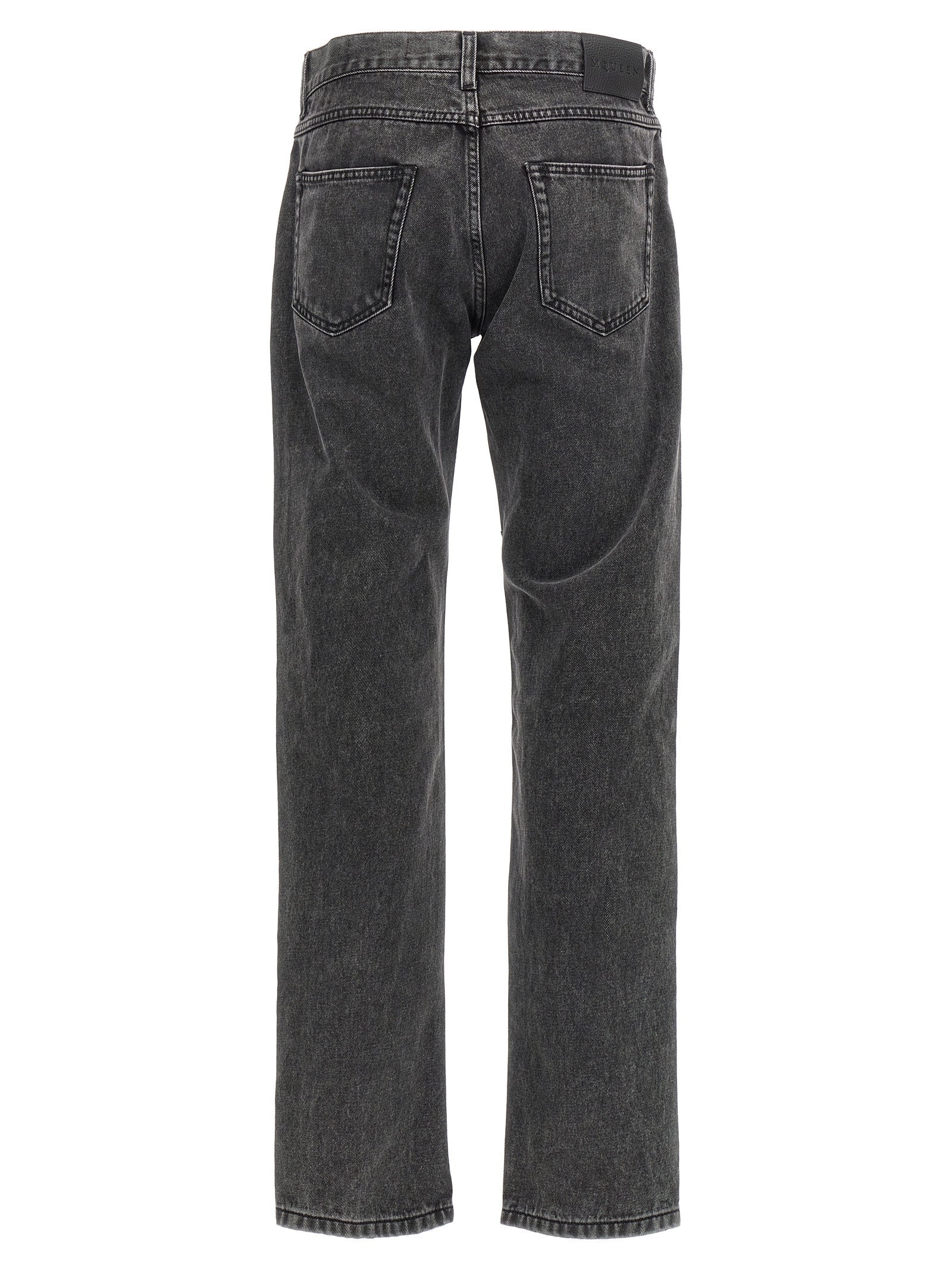 Discover the Alexander McQueen Black Cotton Straight-Leg Jeans, a fusion of exquisite craftsmanship and timeless elegance, perfect for those who embrace luxury and individuality.