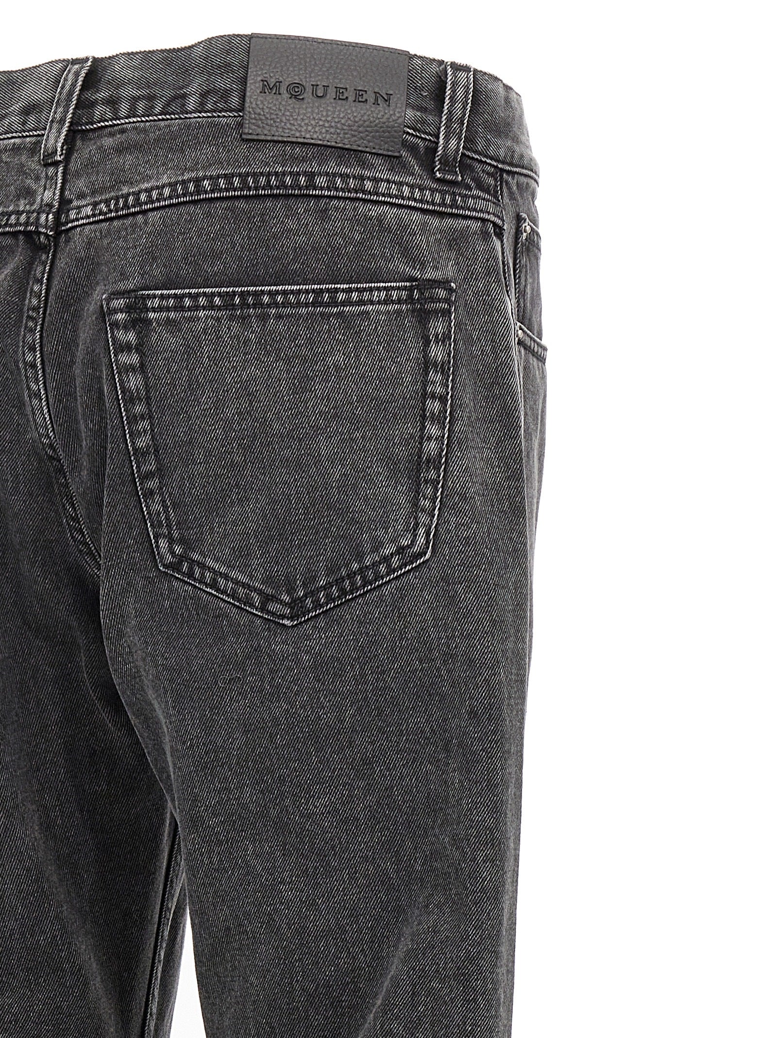 Discover the Alexander McQueen Black Cotton Straight-Leg Jeans, where exquisite craftsmanship meets timeless elegance, perfect for the discerning fashion connoisseur.