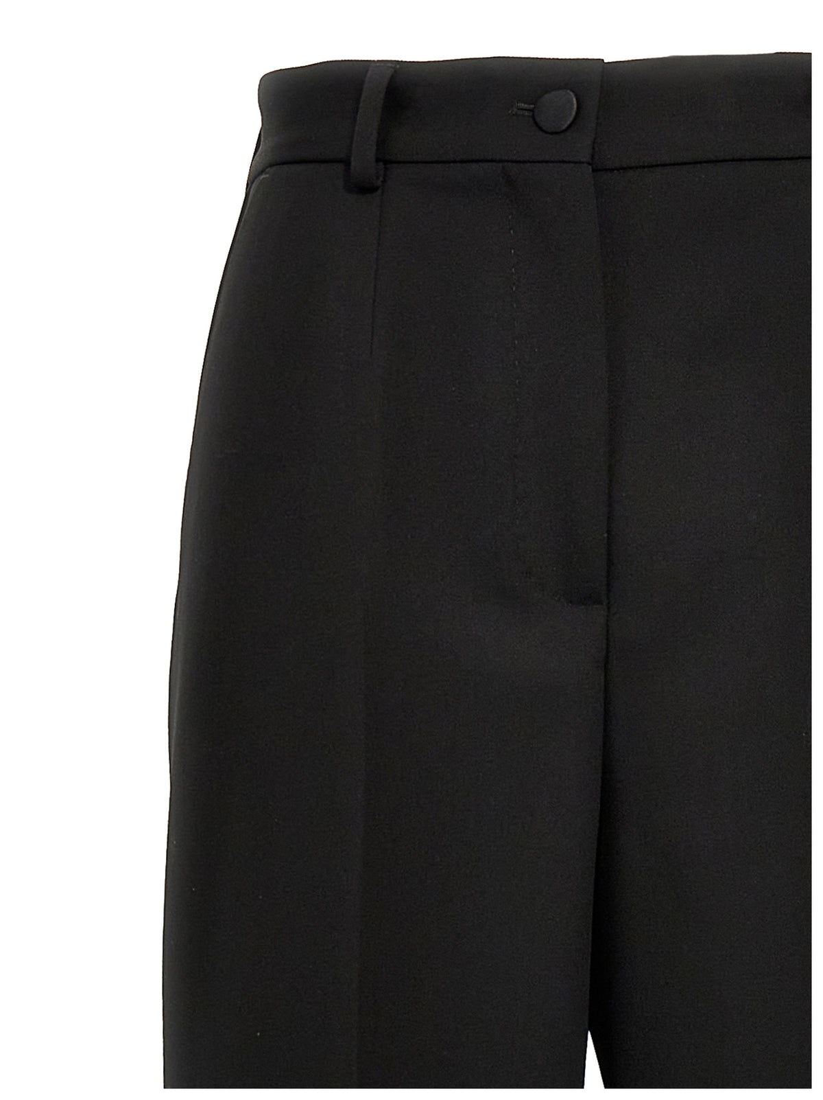 Elevate your elegance with the Dolce & Gabbana Black Virgin Wool Tuxedo, a masterpiece of Italian craftsmanship, blending luxurious wool and silk for timeless sophistication.