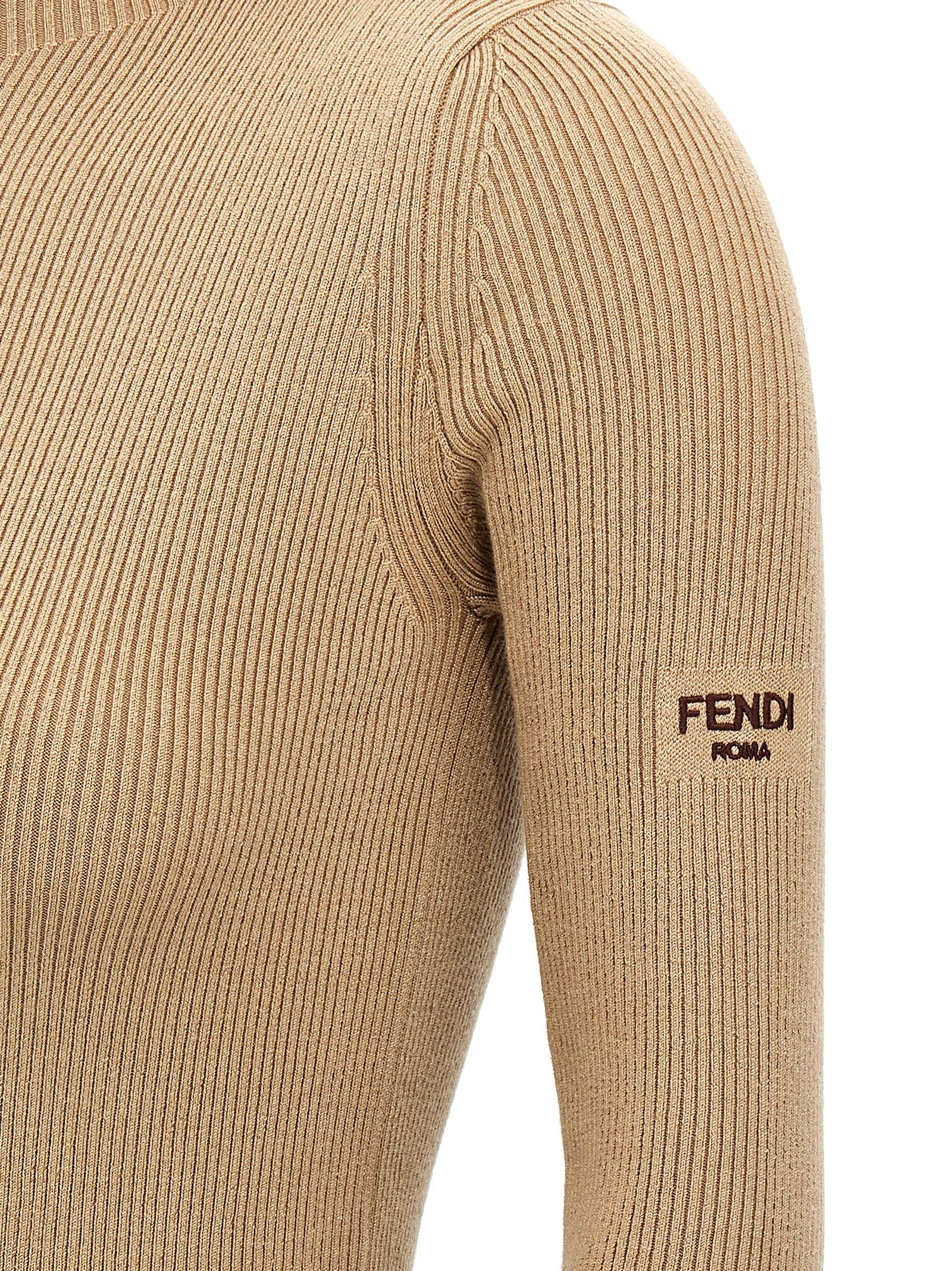 Experience the exquisite allure of Fendi's Beige Wool Short Dress, a luxurious blend of wool and silk that redefines sophistication for the discerning individual.