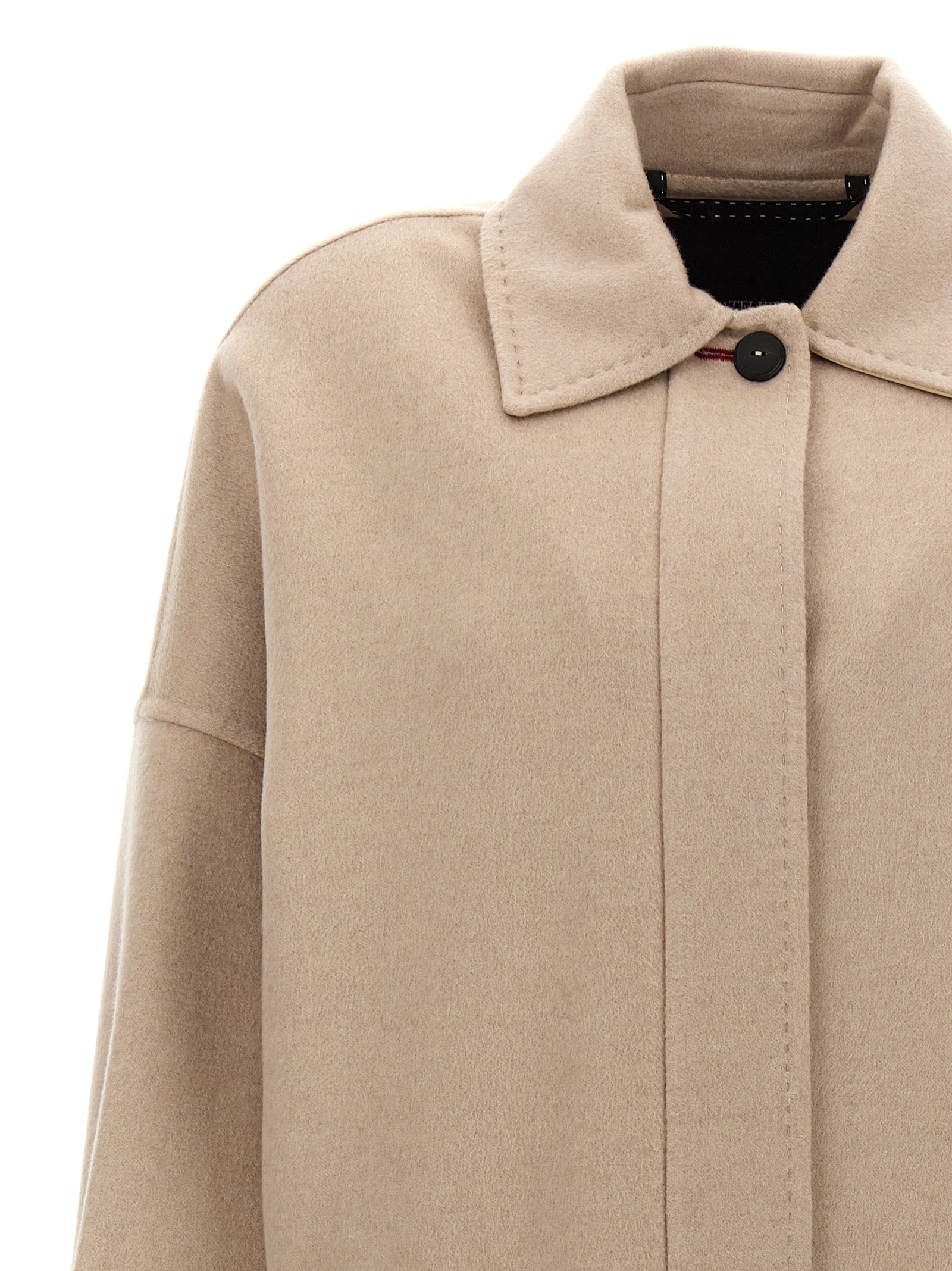 Elevate your wardrobe with the Max Mara Beige Cashmere Coat, a masterpiece of artisanal craftsmanship in luxurious 100% cashmere, embodying timeless elegance and sophistication.