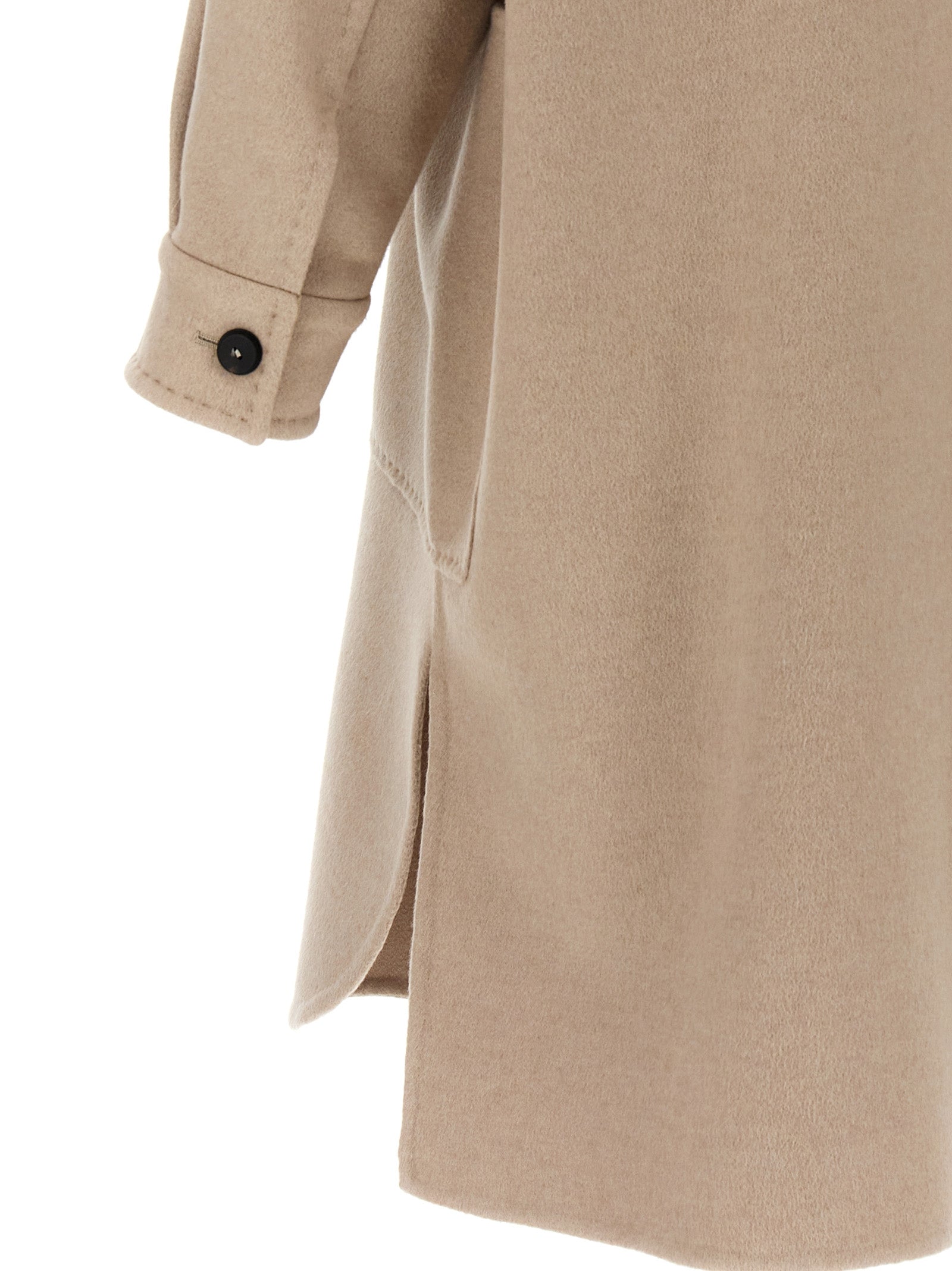 Elevate your wardrobe with the Max Mara Beige Cashmere Coat, a masterpiece of Italian craftsmanship in luxurious 100% cashmere, embodying timeless elegance and sophistication.