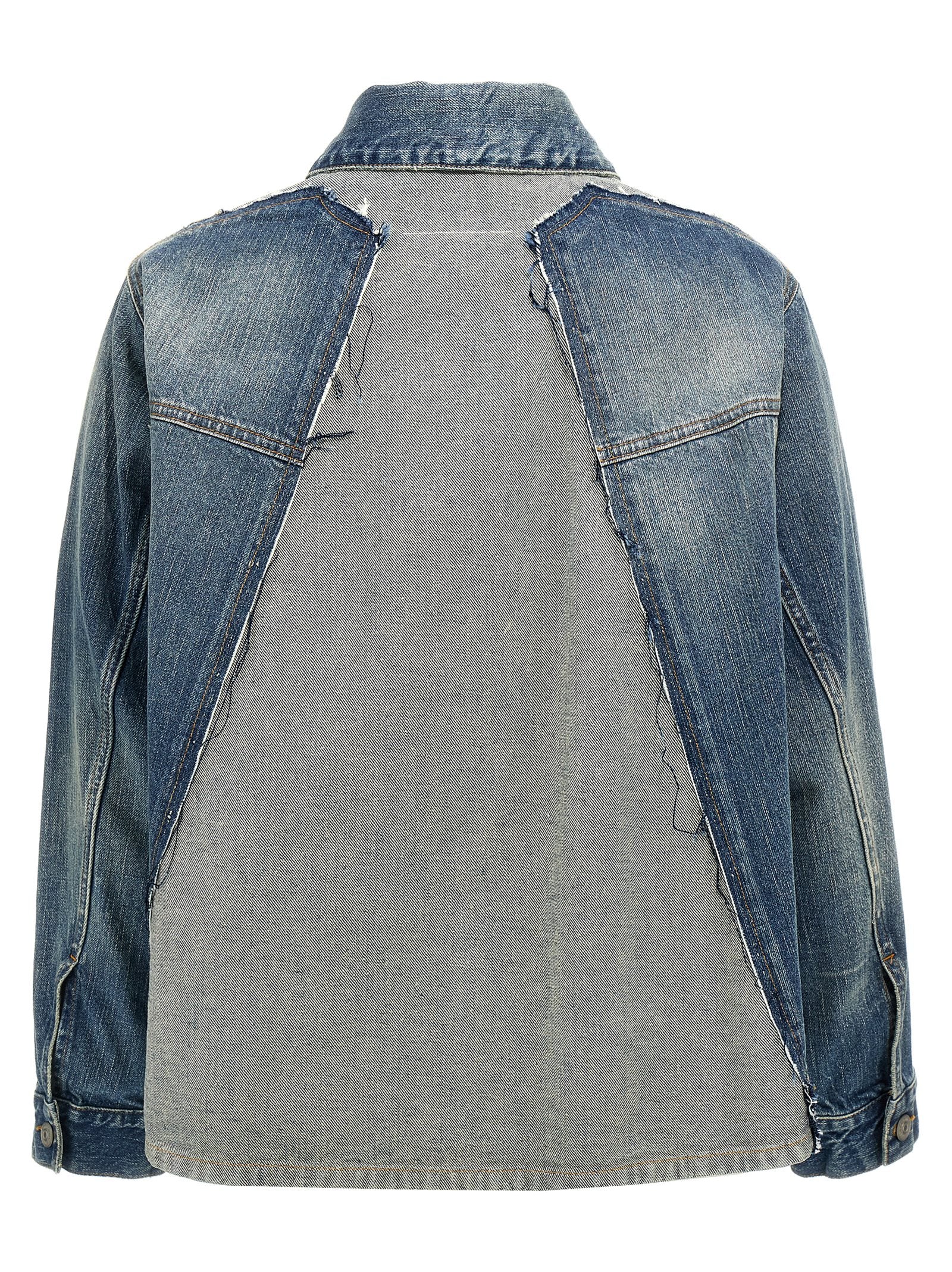 Elevate your wardrobe with the MM6 Maison Margiela Blue Cotton Denim Jacket, a masterpiece of artisanal luxury, designed for those who embrace unique style and sophistication.