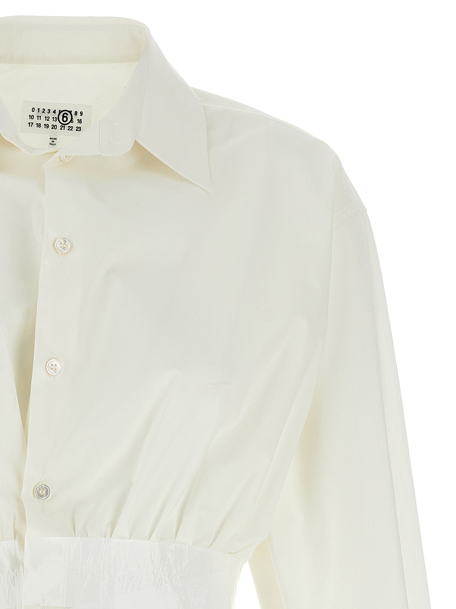 Elevate your wardrobe with the MM6 Maison Margiela White Cotton Blouse, a masterpiece of couture elegance crafted in Italy, perfect for timeless sophistication.