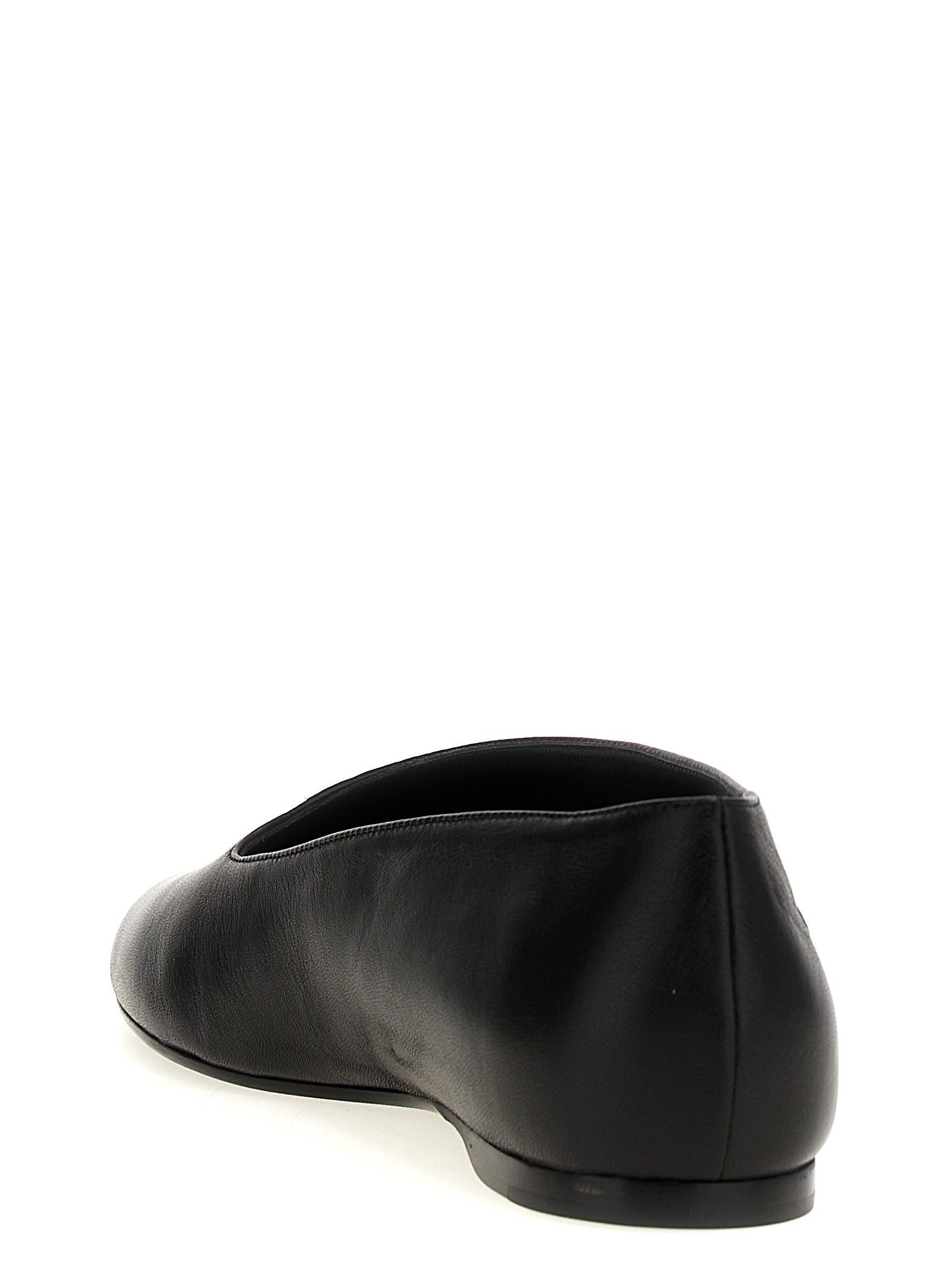 Step into the realm of sophistication with Khaite Black Lamb Leather Ballet Flats, where artisanal craftsmanship meets modern elegance, perfect for the discerning connoisseur.
