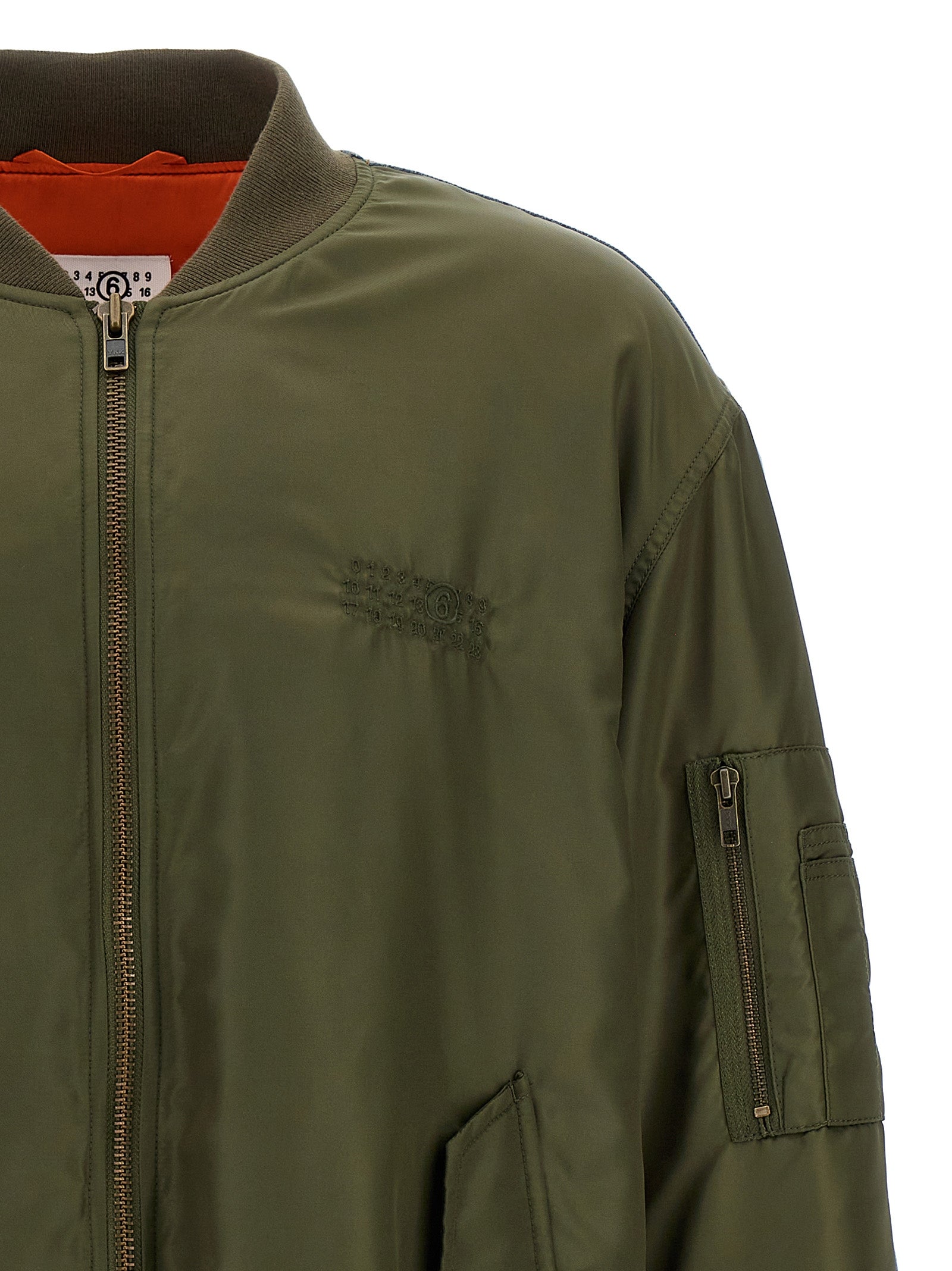 Elevate your style with the MM6 Maison Margiela Multicolor Polyamide Bomber, a luxurious statement piece crafted in Italy, embodying sophistication and modern elegance.