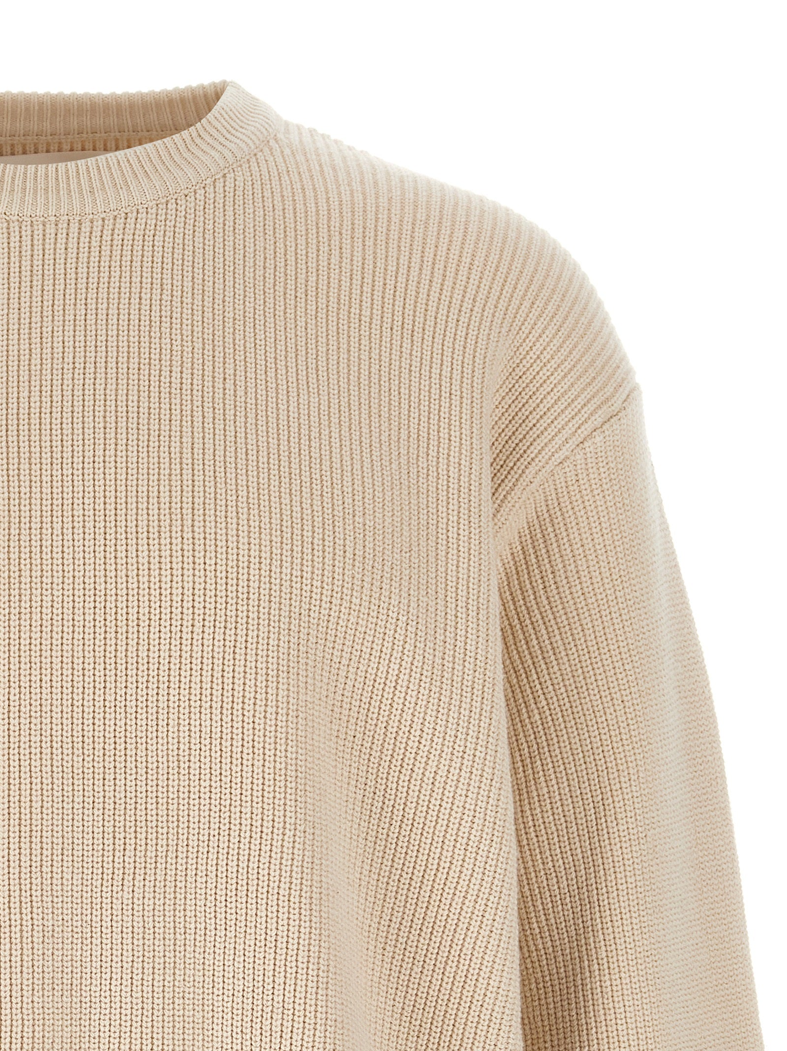 Elevate your wardrobe with the Jil Sander Beige Cotton Cardigan, a masterpiece of luxury knitwear crafted in Italy, embodying timeless elegance and refined sophistication.