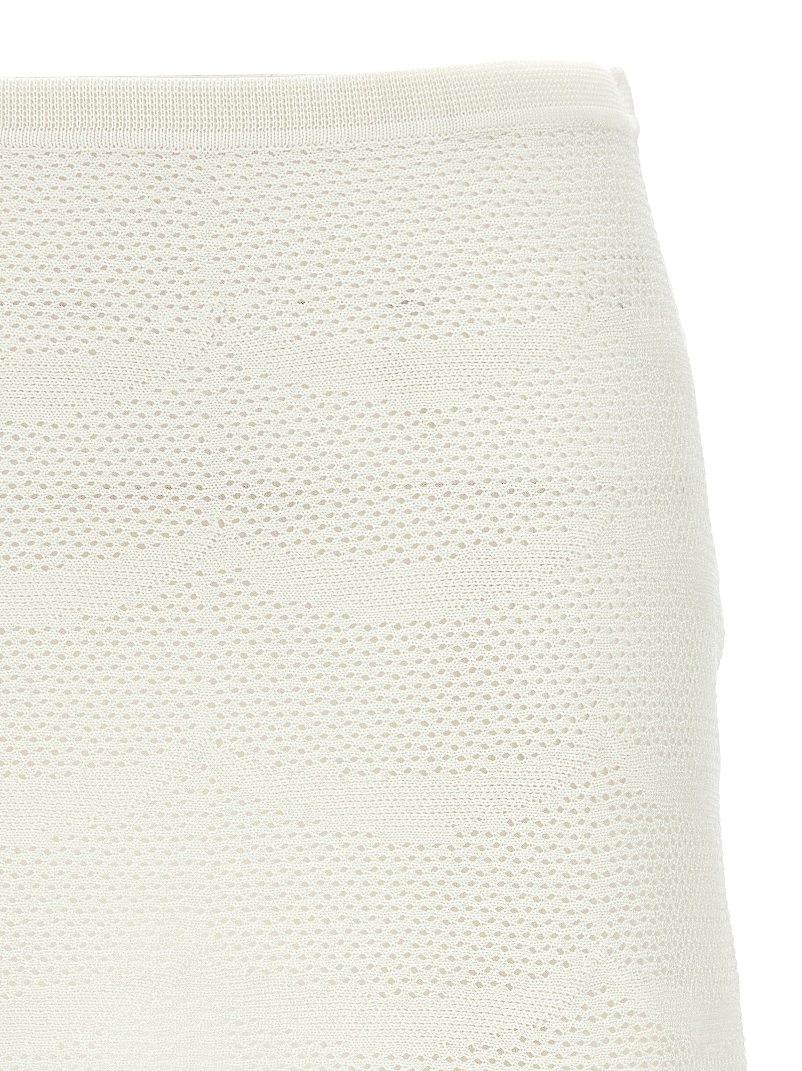 Elevate your style with the Tom Ford White Cotton Long Skirt, a luxurious blend of cotton and silk, showcasing exquisite craftsmanship and timeless elegance.