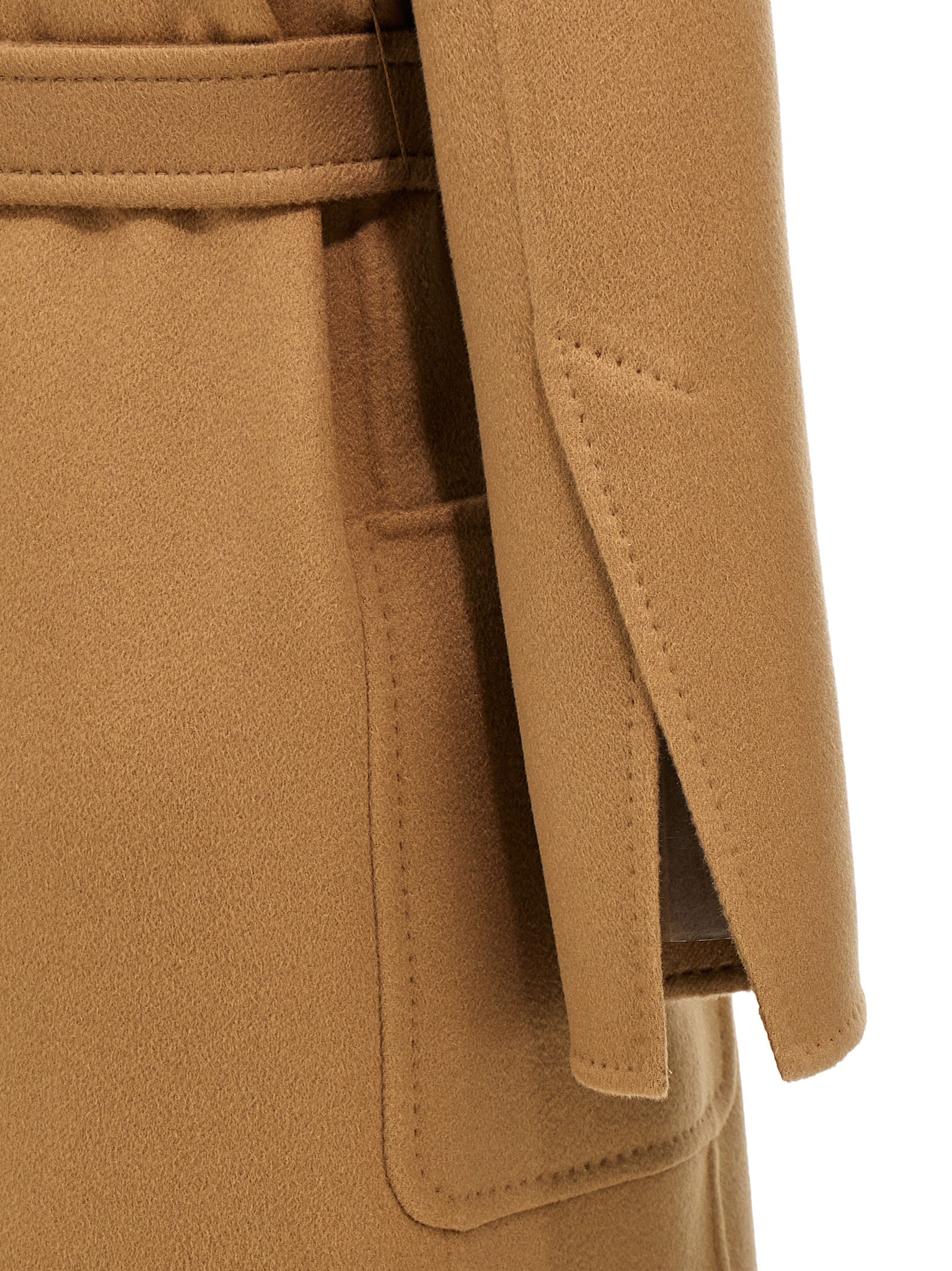 Elevate your winter elegance with the Max Mara Brown Cashmere Coat, a masterpiece of artisanal luxury crafted from sumptuous goat cashmere, perfect for discerning tastes.