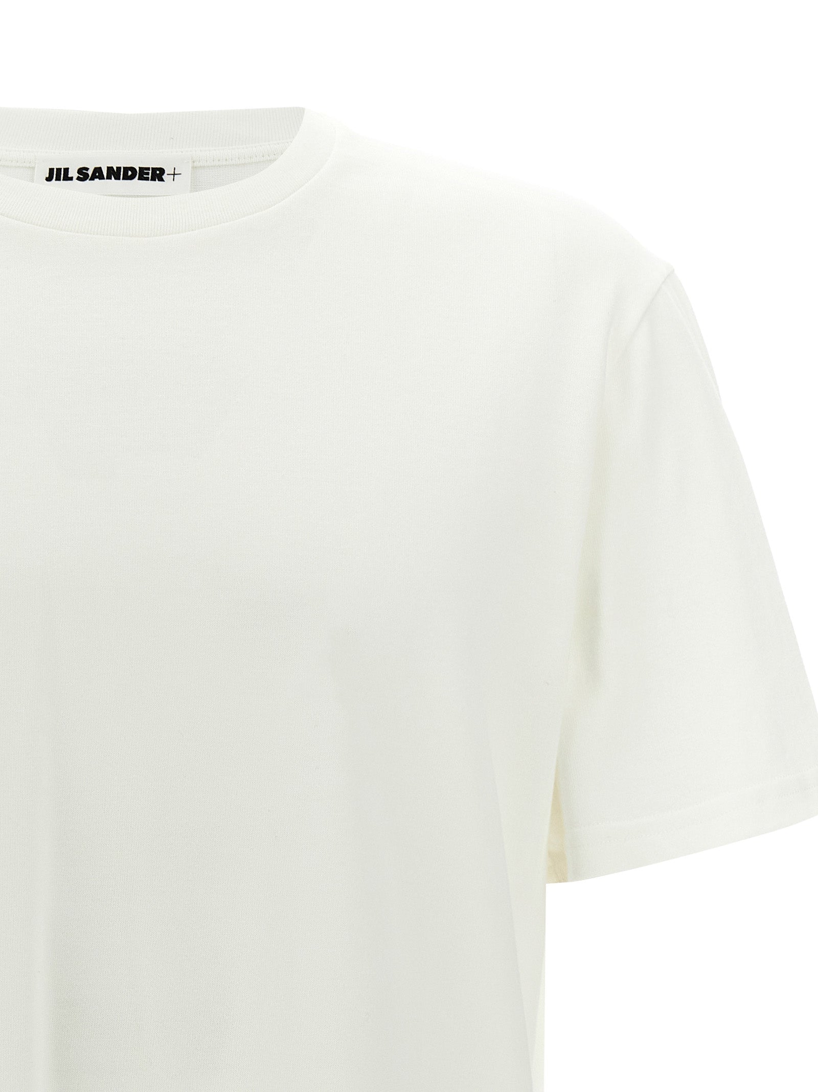 Elevate your style with Jil Sander's White Cotton T-Shirt, a masterpiece of Italian craftsmanship, featuring a bold leather logo for timeless sophistication.