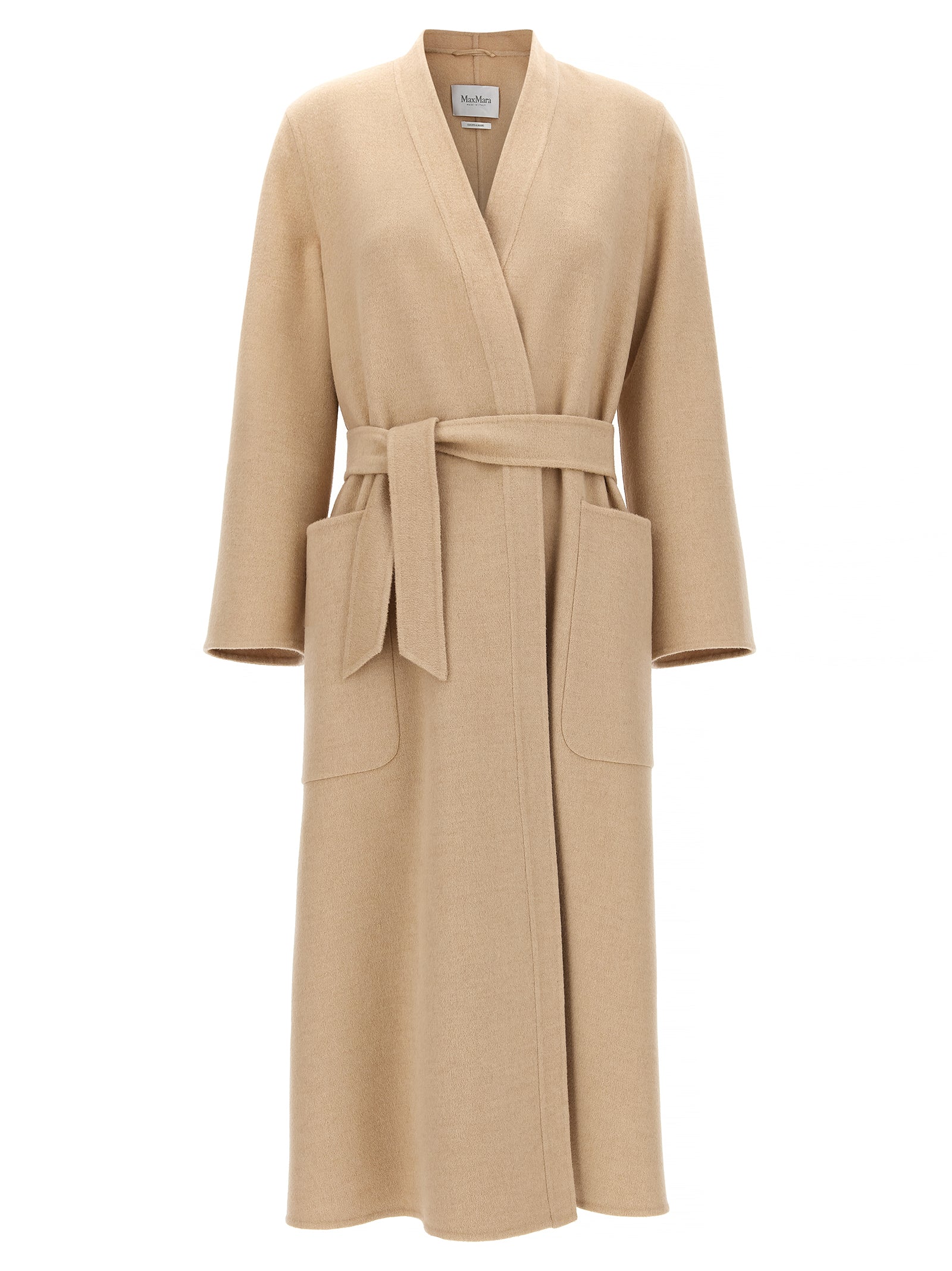 Experience the allure of the Max Mara Vezzoso coat, crafted from pure camel wool, embodying timeless elegance and artisanal luxury for the discerning individual.