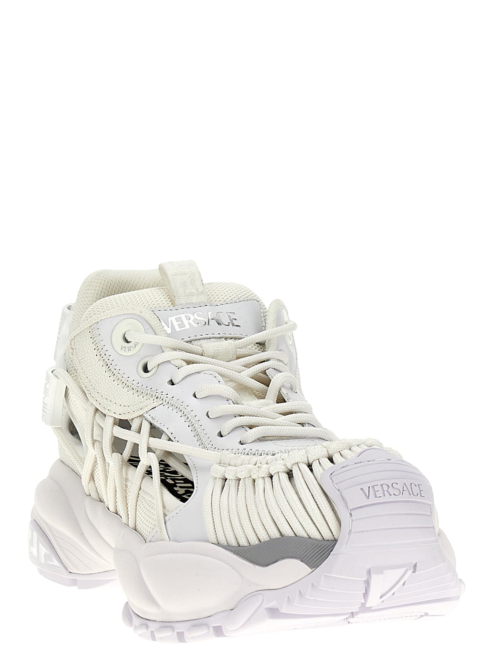 Experience the allure of Versace's White Calfskin Athletic Sneakers, where luxurious craftsmanship meets contemporary design, perfect for the discerning trendsetter.