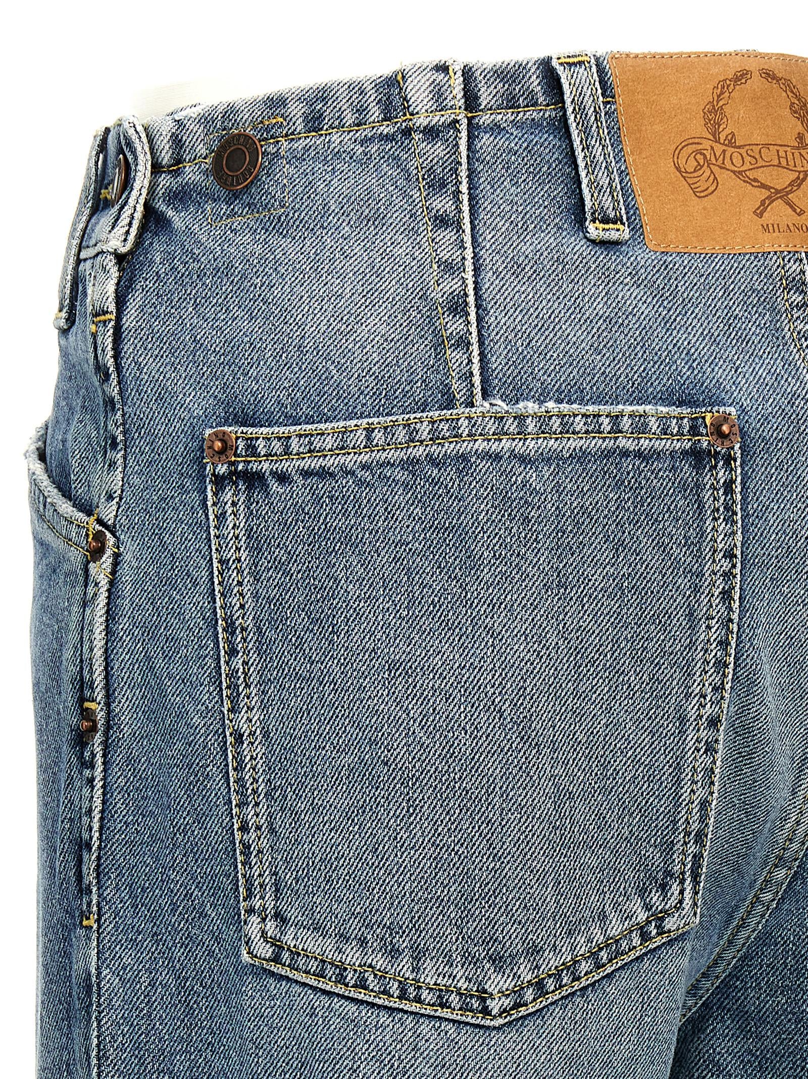 Experience the epitome of luxury with Moschino Blue Cotton Straight-Leg Jeans, crafted from 100% cotton for a flawless fit that embodies timeless elegance and modern sophistication.