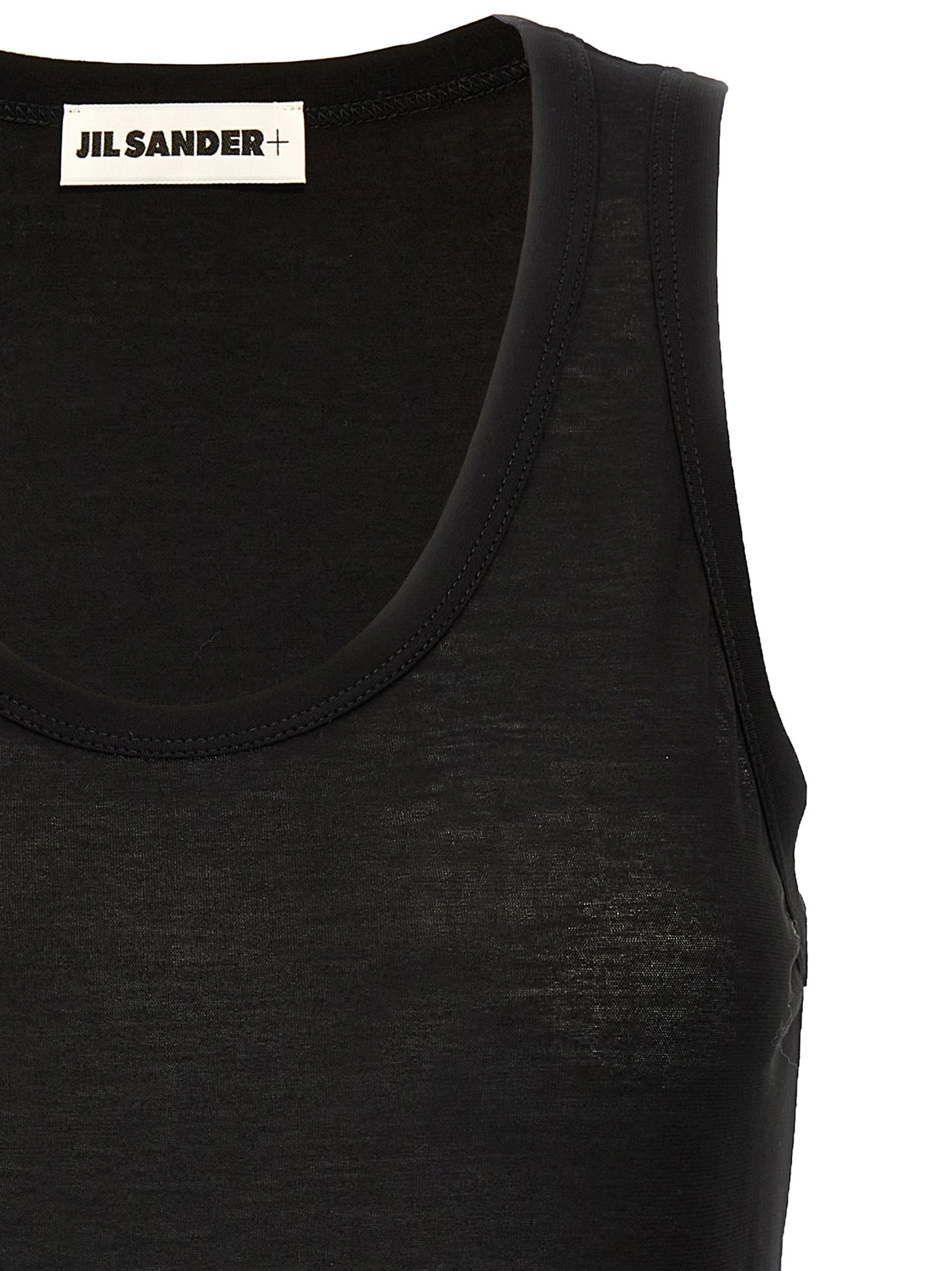 Elevate your wardrobe with the Jil Sander Black Cotton Sleeveless T-Shirt, a timeless Italian piece that embodies sophistication and effortless elegance for the discerning individual.