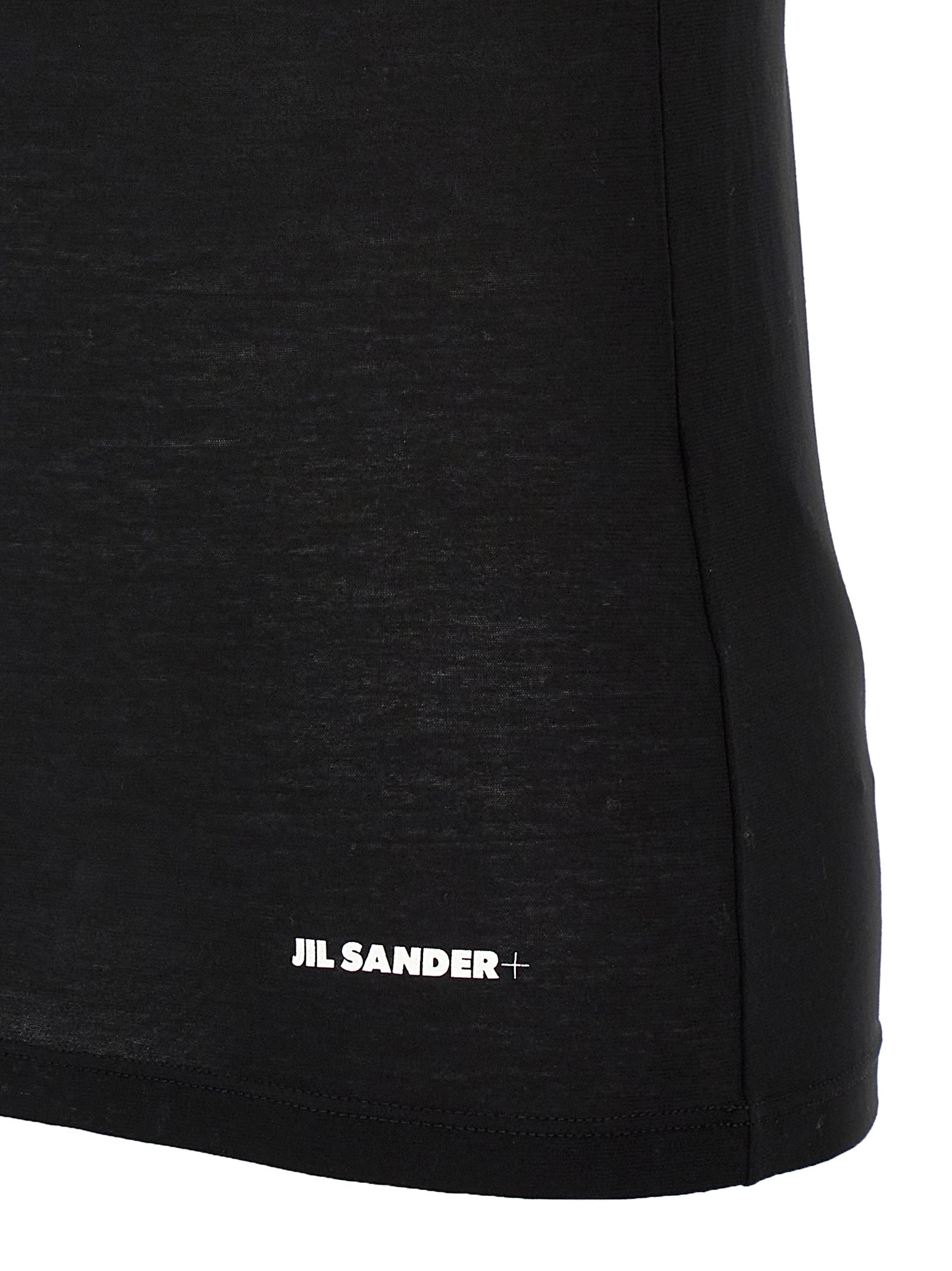 Elevate your wardrobe with the Jil Sander Black Cotton Sleeveless T-Shirt, a masterpiece of Italian craftsmanship, embodying timeless elegance and effortless sophistication.