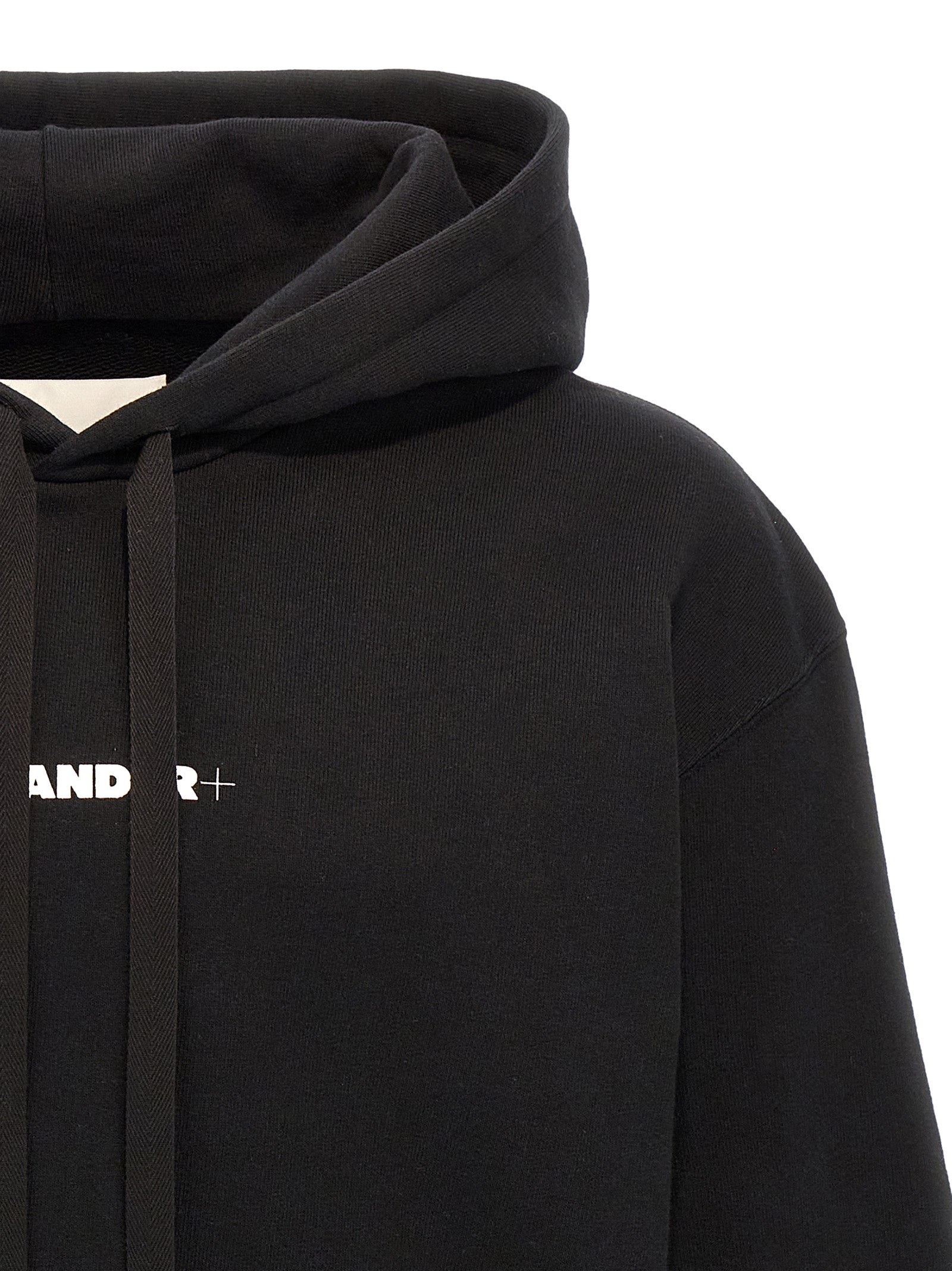 Indulge in the Jil Sander Black Cotton Sweatshirt, a masterpiece of Italian craftsmanship, blending luxurious comfort with sophisticated style for the discerning individual.