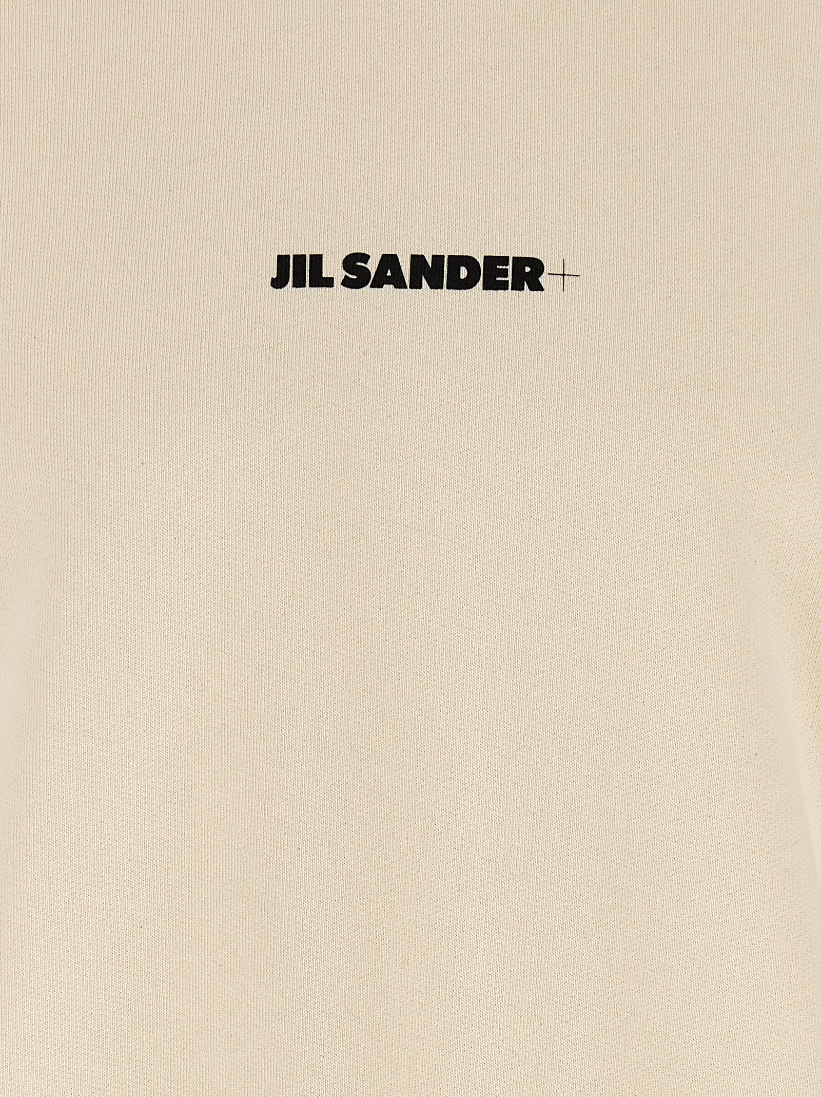 Elevate your wardrobe with the Jil Sander Beige Cotton Sweatshirt, crafted from 100% brushed cotton for a luxurious embrace that redefines effortless elegance.