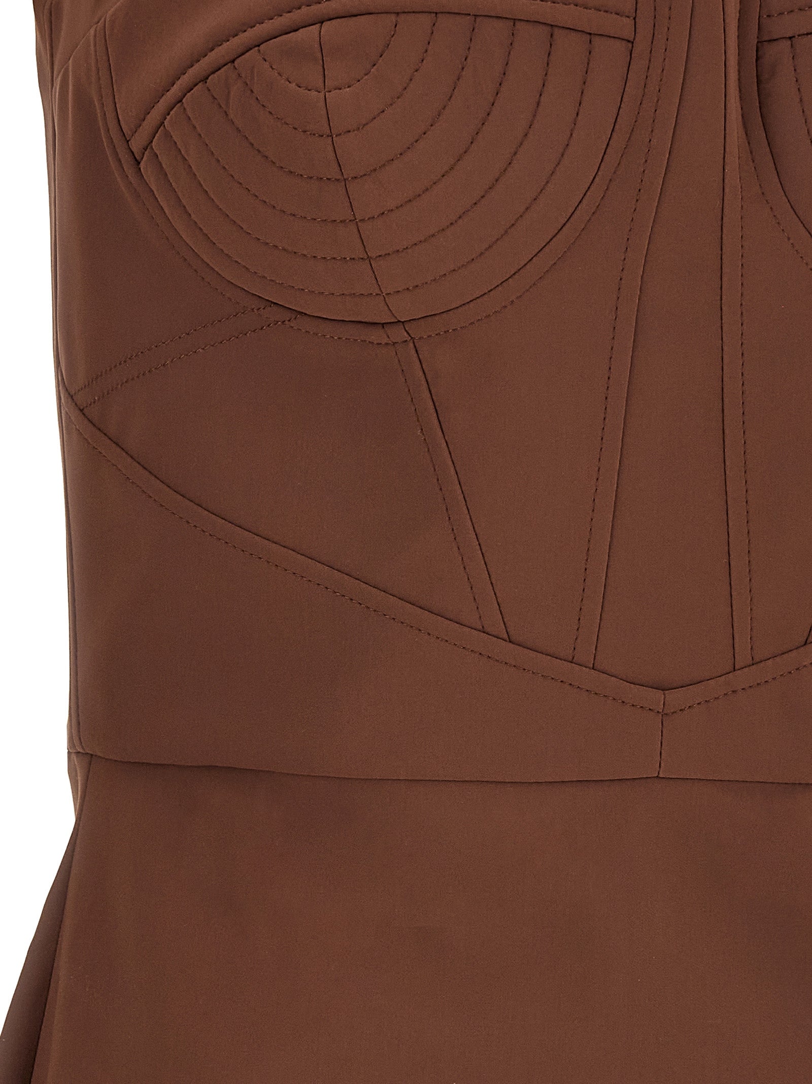 Indulge in the Nensi Dojaka Brown Polyamide Short Dress, a luxurious blend of elegance and allure, crafted for those who command attention and celebrate sophistication.