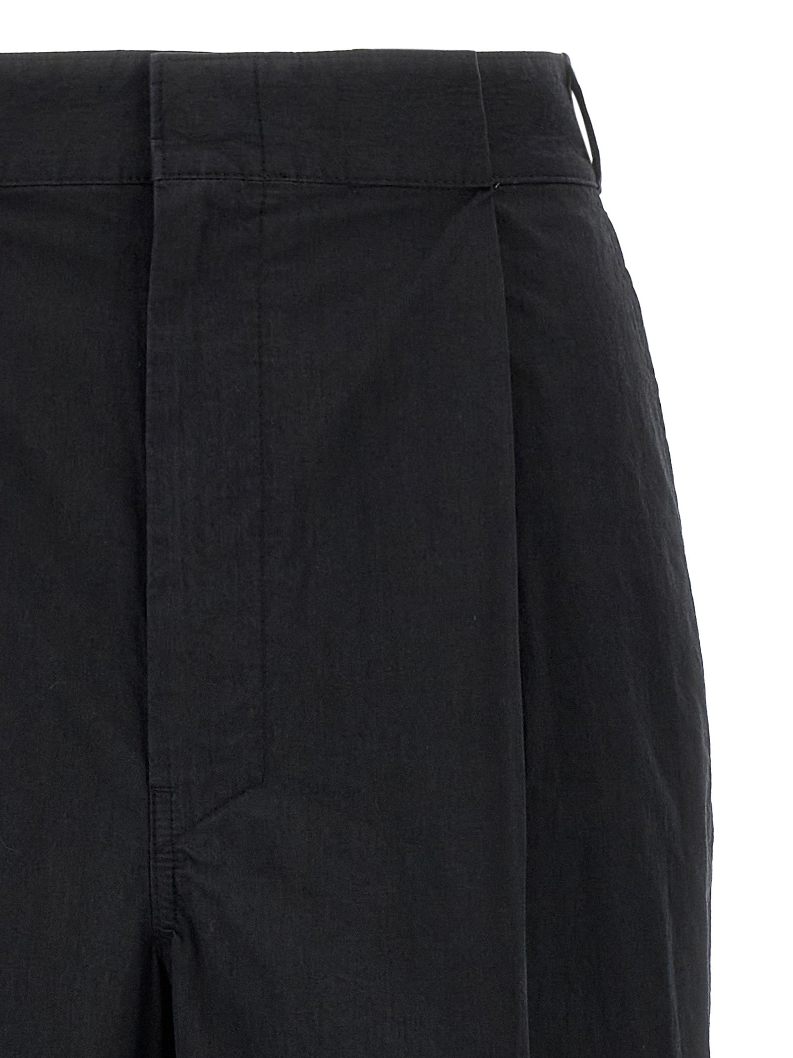 Discover the Maison Margiela Black Cotton Casual Pants, a luxurious blend of comfort and elegance, perfect for those who appreciate refined artistry and timeless style.