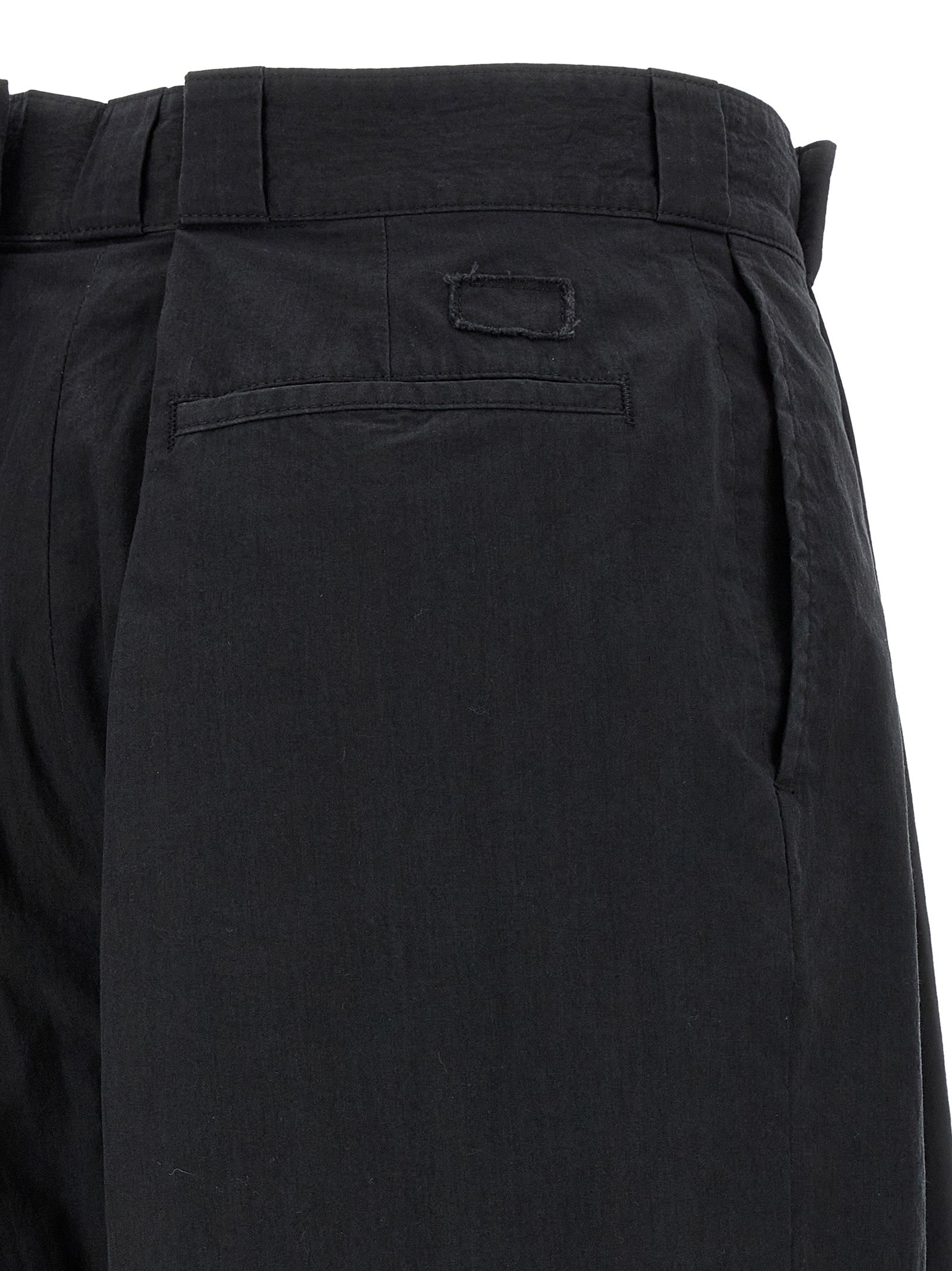Elevate your wardrobe with Maison Margiela's Black Cotton Casual Pants, a luxurious blend of comfort and sophistication, designed for the discerning fashionista.