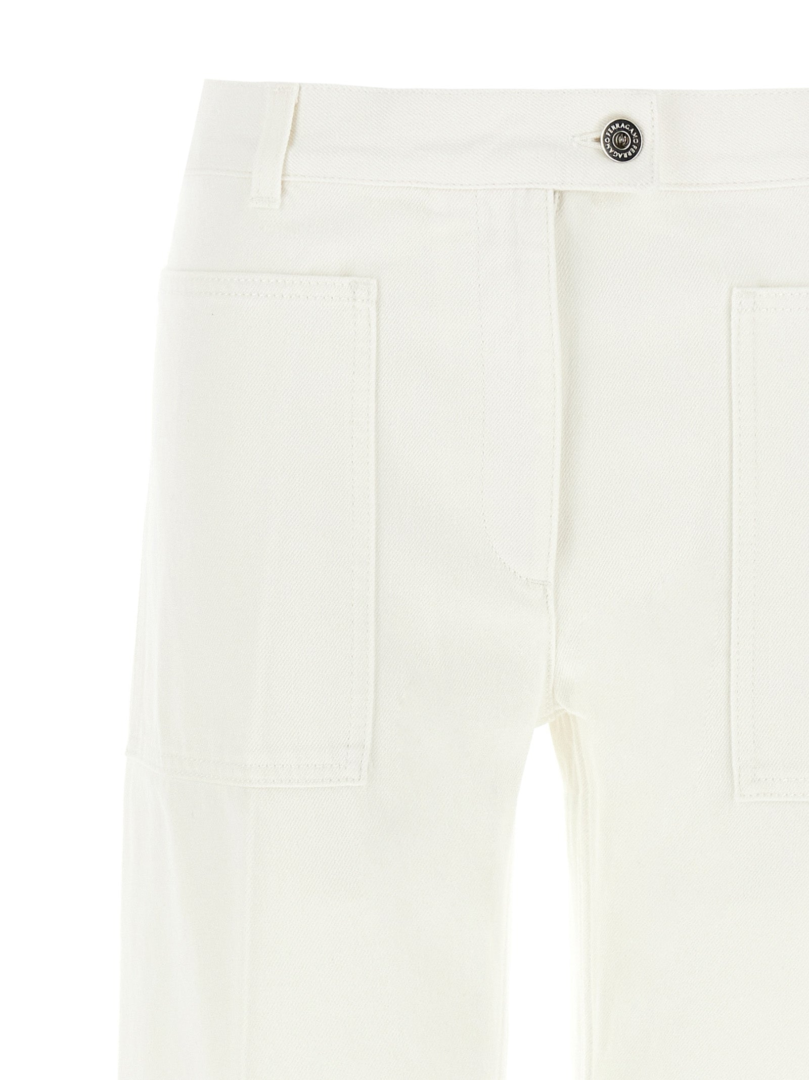 Elevate your wardrobe with Ferragamo's White Cotton Straight-Leg Jeans, a masterpiece of Italian craftsmanship that embodies timeless elegance and modern sophistication.