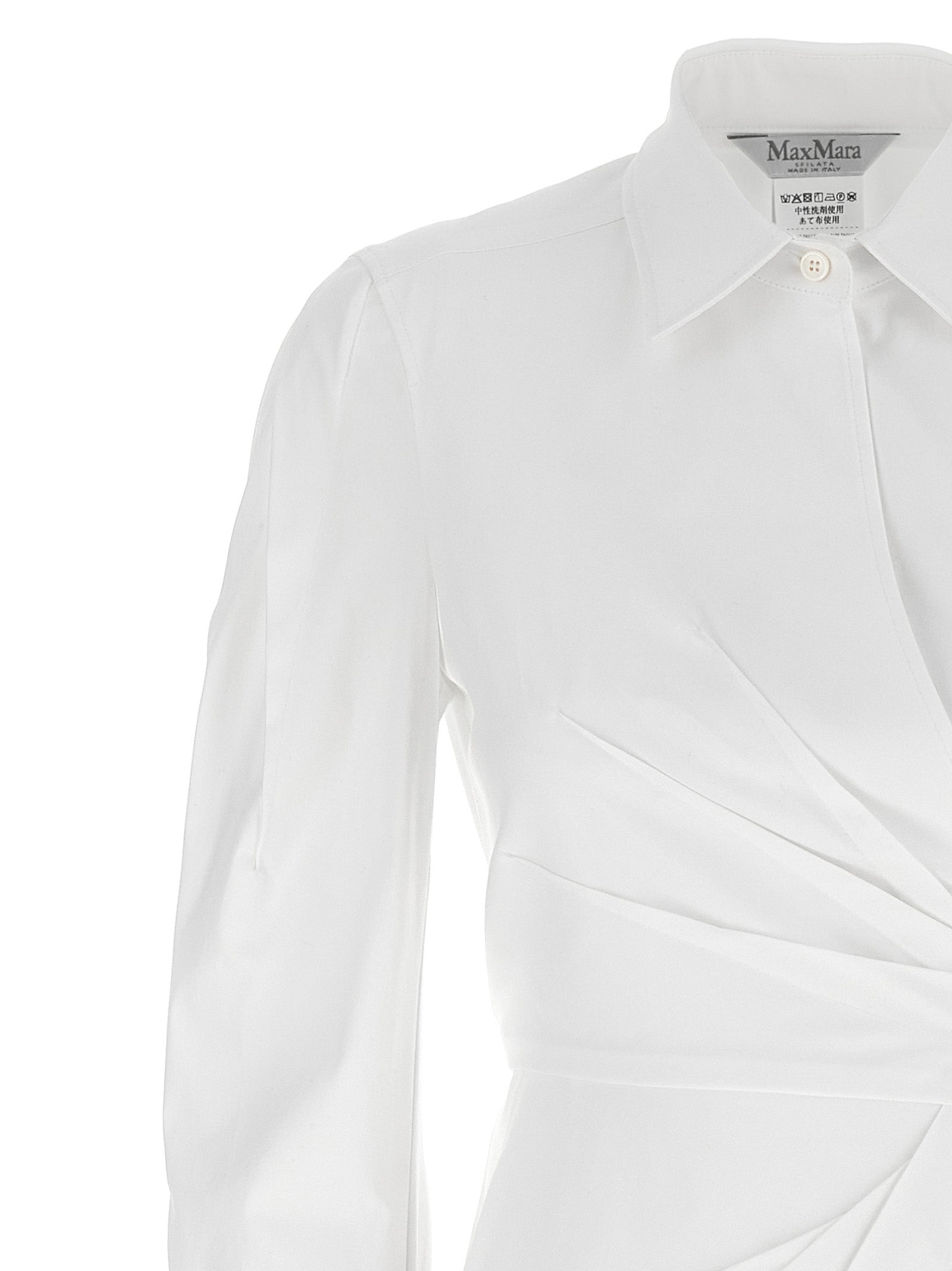 Discover the Max Mara White Cotton Long Dress, a masterpiece of artisanal elegance, crafted from premium cotton for a sophisticated allure that transcends occasions.