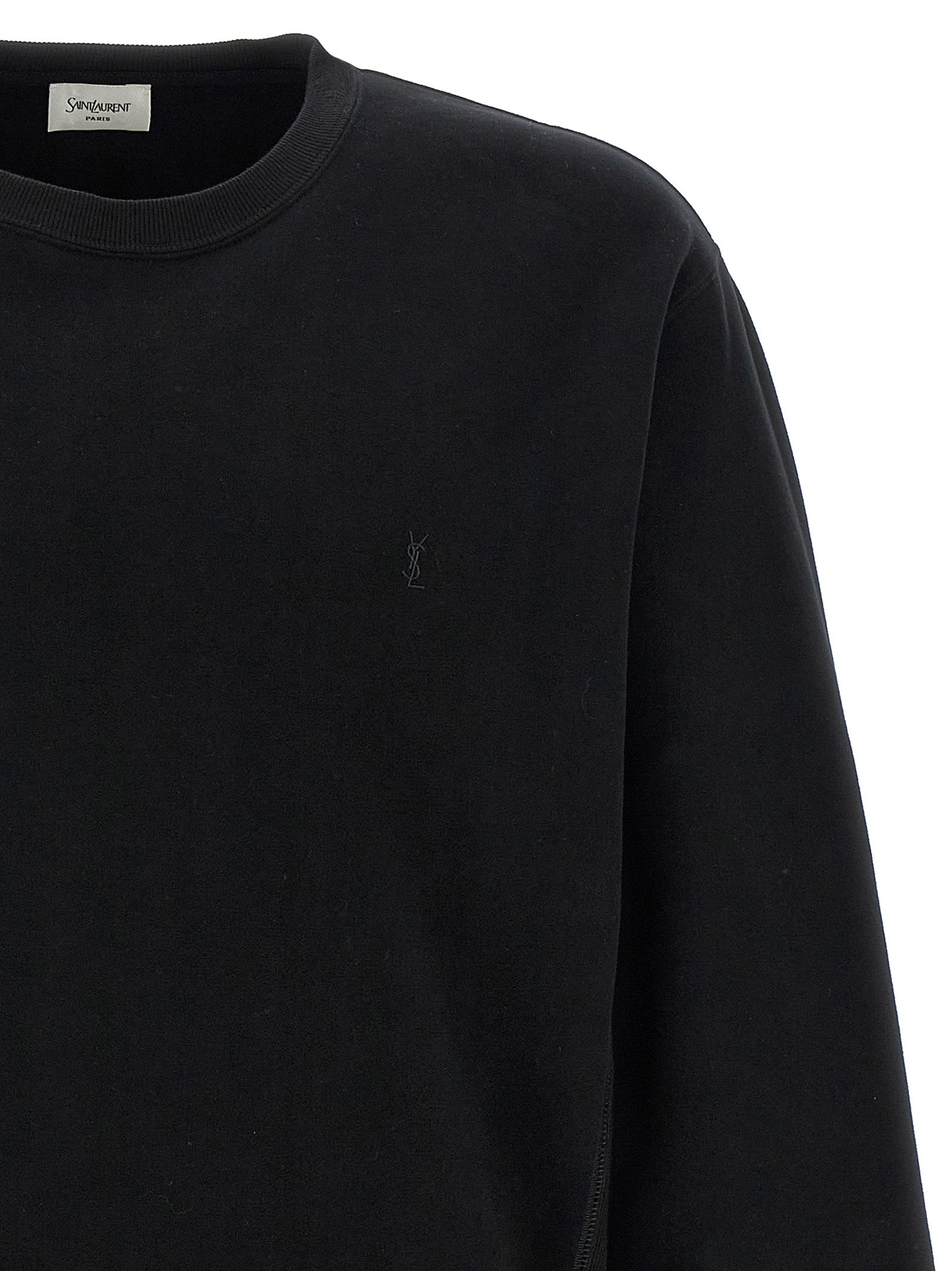 Indulge in the Saint Laurent Black Cotton Sweatshirt, a masterpiece of French craftsmanship, blending luxury and comfort for the discerning individual.