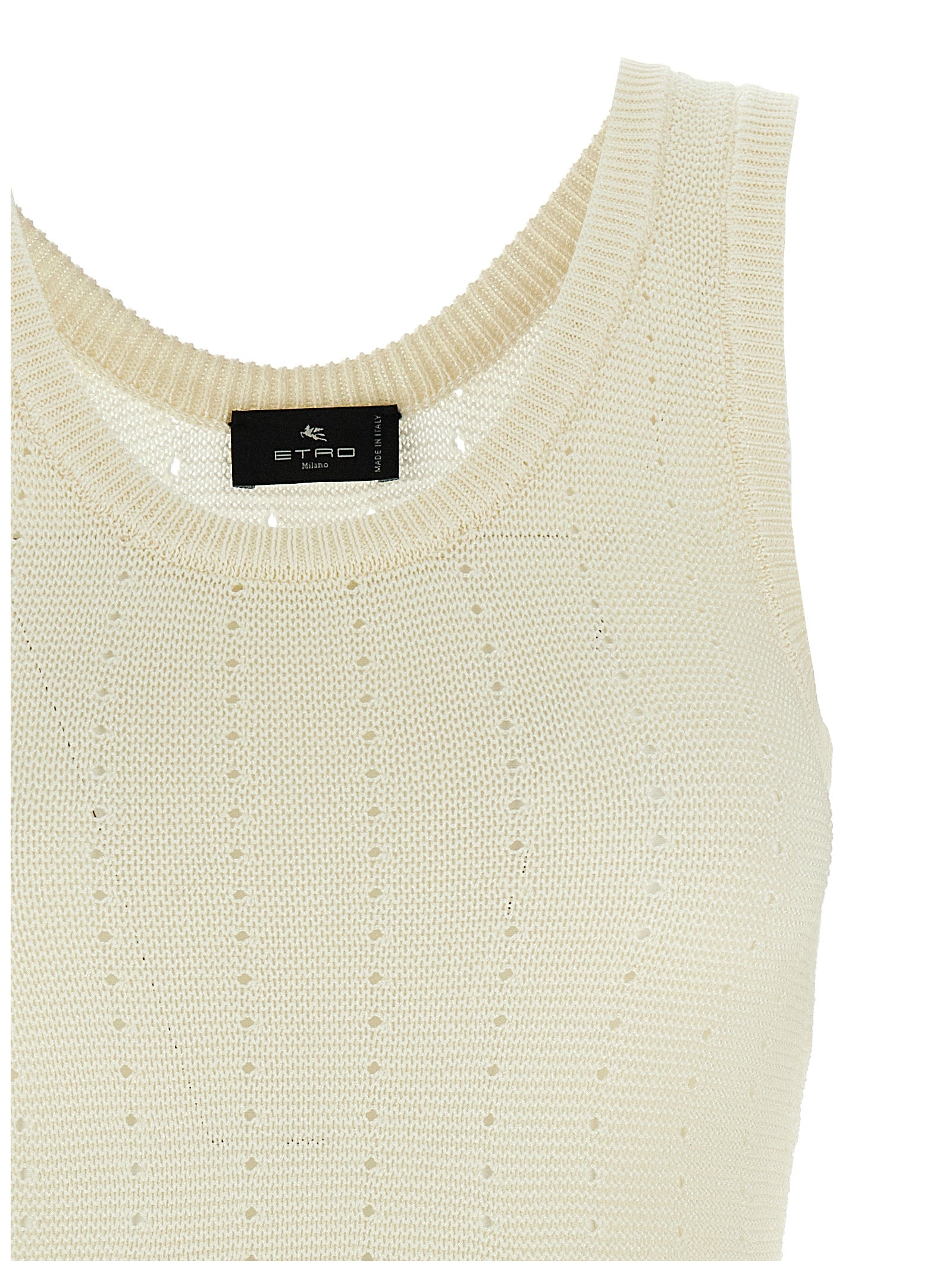 Elevate your style with the Etro White Silk Sleeveless T-Shirt, a luxurious blend of silk and polyamide, embodying Italian craftsmanship and timeless elegance.