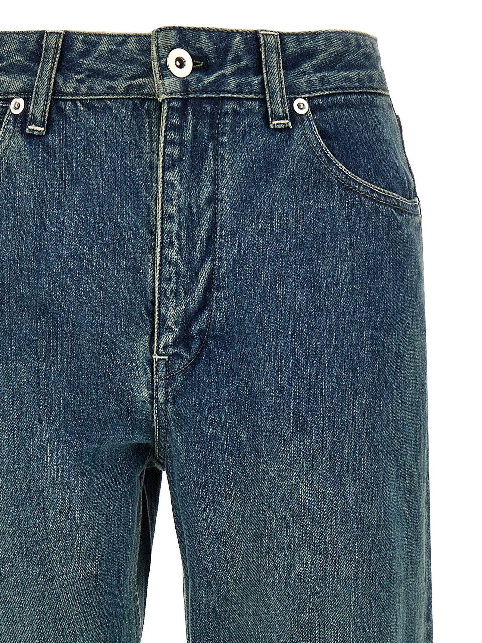 Elevate your style with Jil Sander's Blue Cotton Slim Fit Jeans, where artisanal craftsmanship meets contemporary elegance, perfect for the discerning individual.