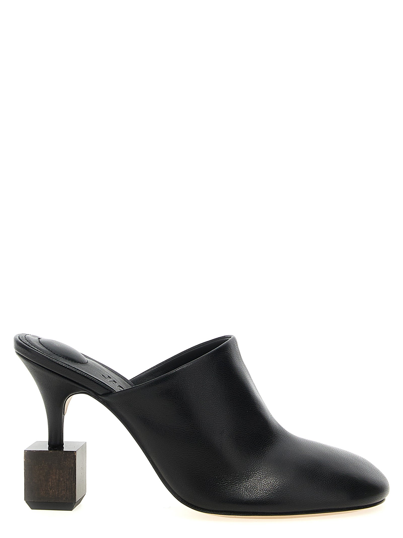 Step into the realm of luxury with Jacquemus Black Lamb Leather High Heel Pumps, where exquisite craftsmanship meets avant-garde design, embodying elegance and individuality.