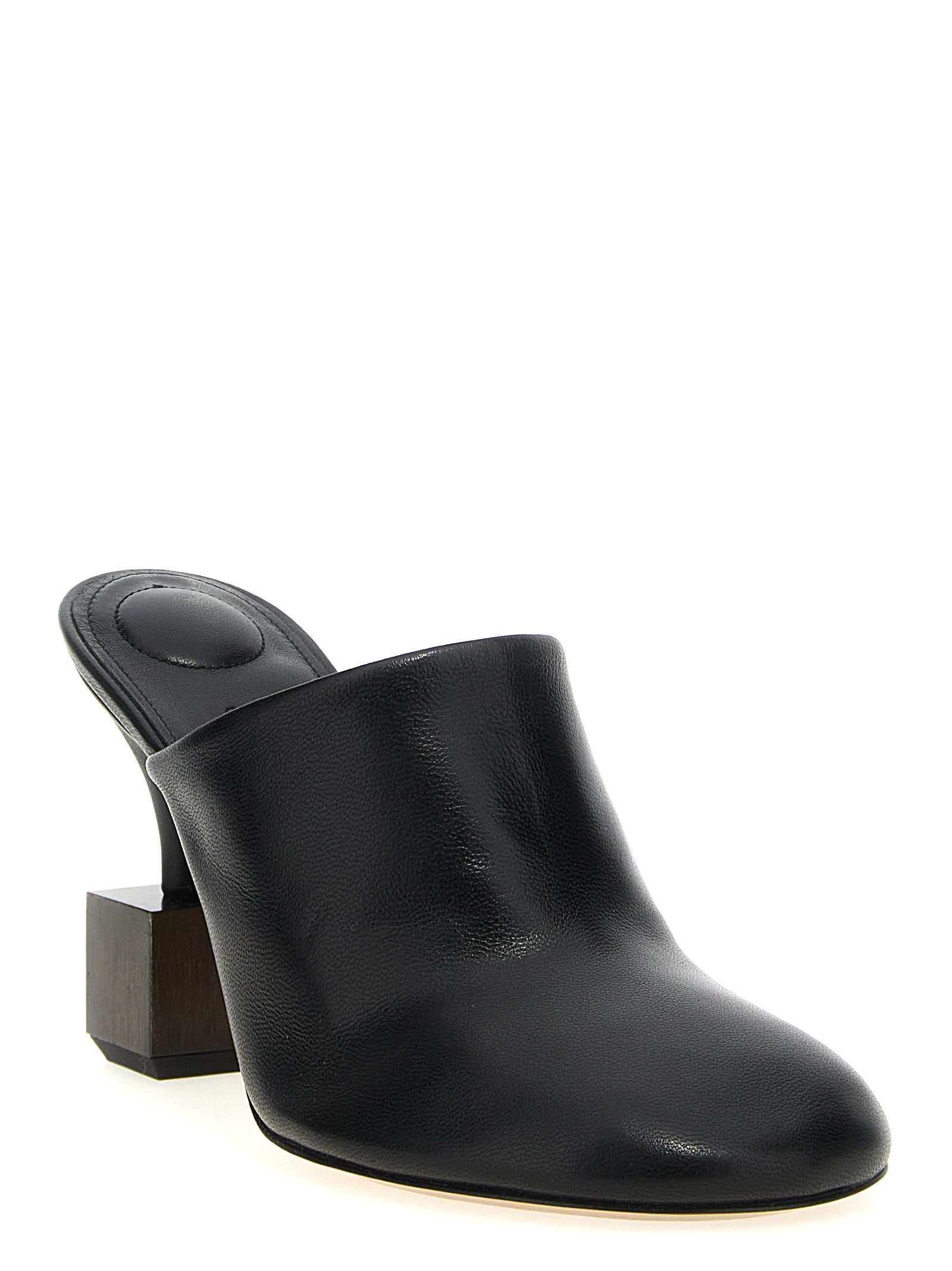Step into the realm of luxury with Jacquemus Black Lamb Leather High Heel Pumps, where exquisite craftsmanship and avant-garde design redefine elegance and individuality.