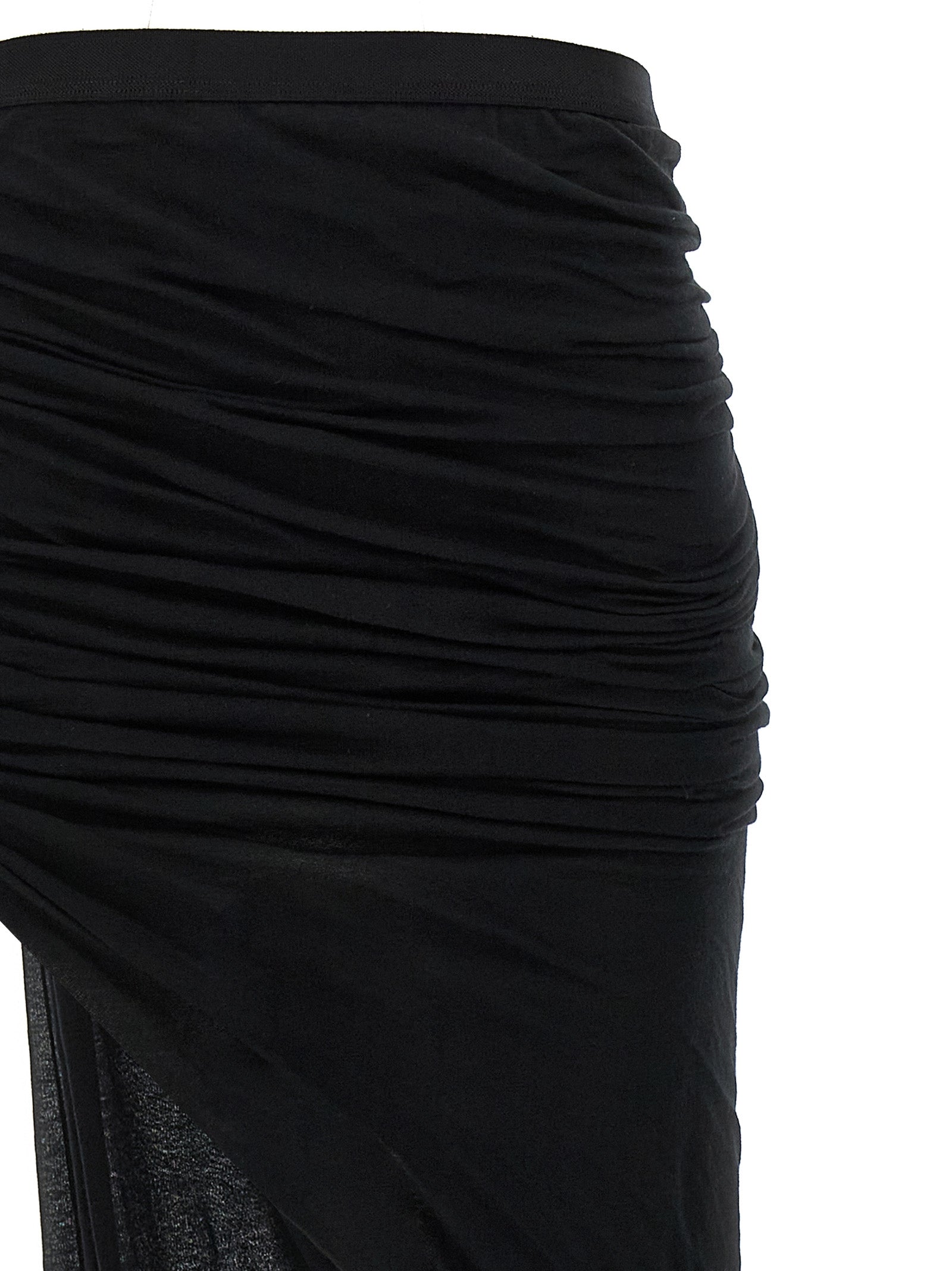 Elevate your style with the Rick Owens Black Cotton Mini Skirt, a masterpiece of semi-transparent elegance and exquisite craftsmanship, designed for the discerning fashion connoisseur.