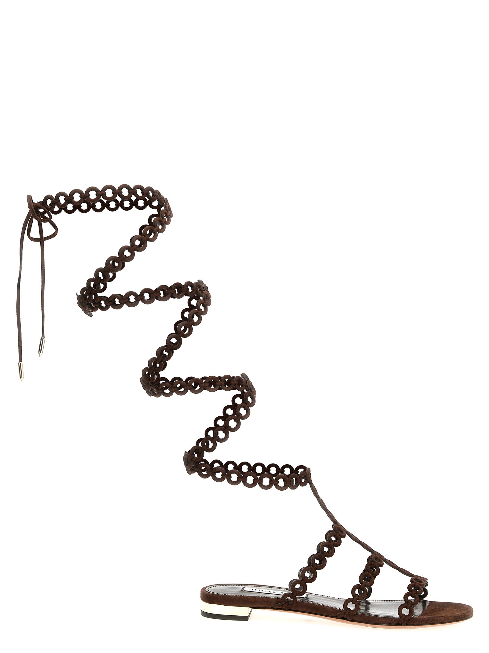 Indulge in the exquisite Aquazzura Brown Goatskin Flat Sandals, where luxurious goat leather meets artisanal craftsmanship, elevating your style with every step.