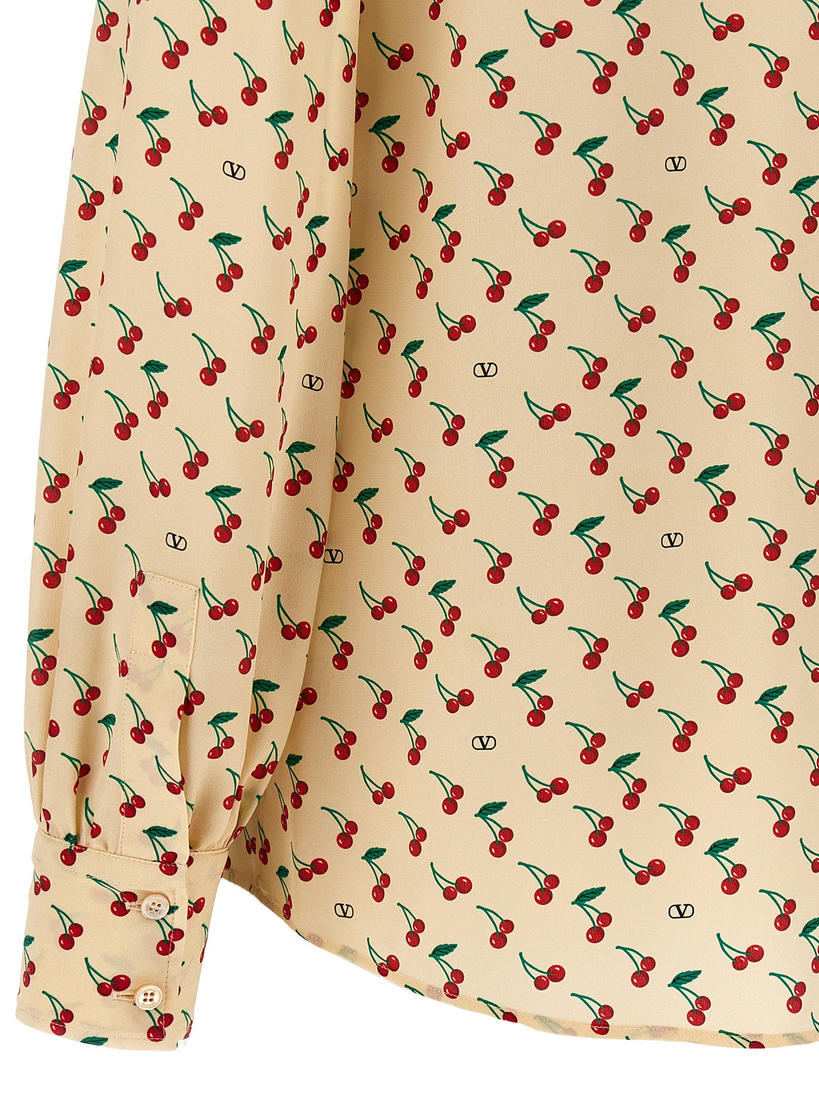 Discover the Valentino Garavani Beige Silk Blouse, a masterpiece of Italian craftsmanship featuring an audacious 'Cherryfic' print, perfect for those who embrace timeless elegance.