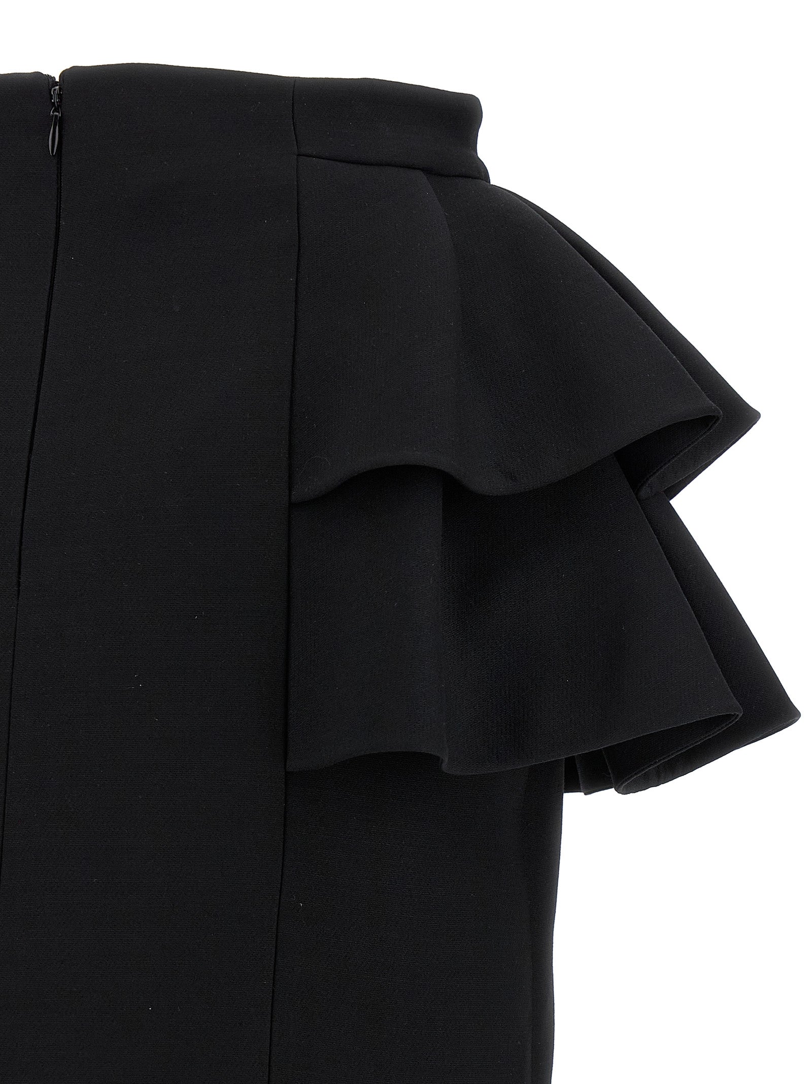 Experience the allure of the Valentino Garavani Black Virgin Wool Midi Skirt, a luxurious blend of virgin wool and silk, crafted for timeless elegance and sophistication.