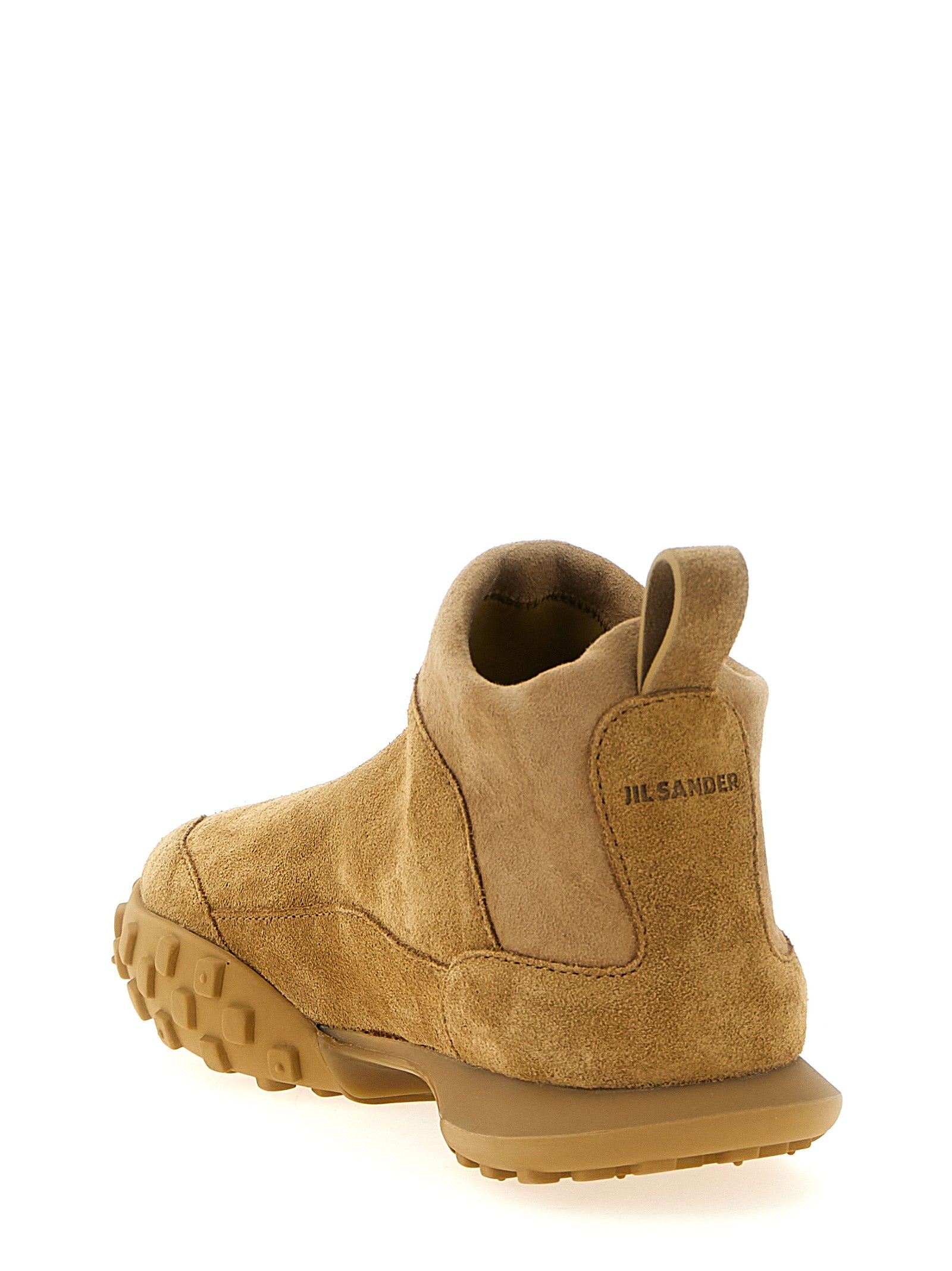 Experience the allure of Jil Sander Beige Calfskin Sneakers, where exquisite craftsmanship meets timeless elegance, perfect for the discerning individual seeking luxury.