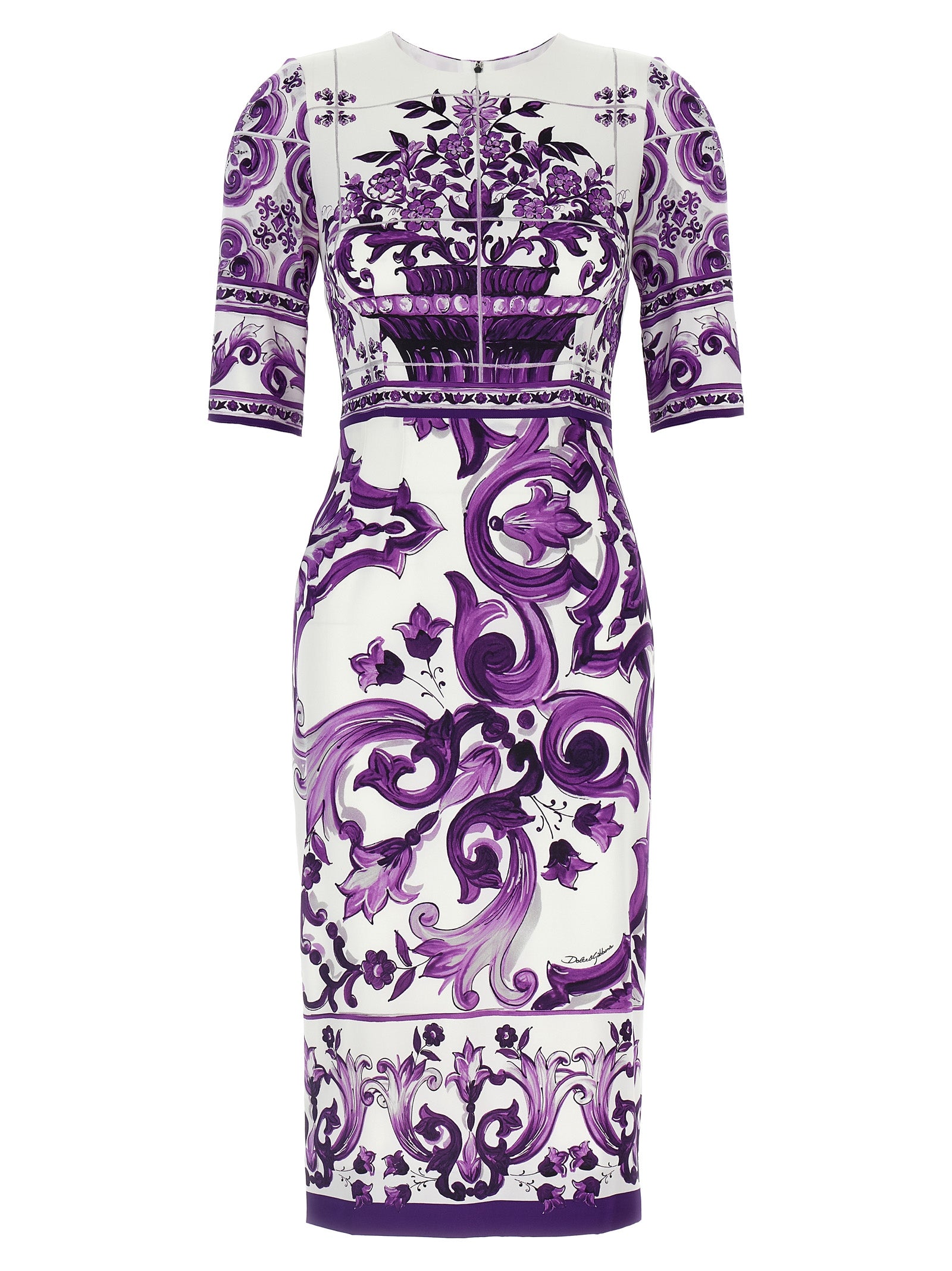 Experience the exquisite allure of the Dolce & Gabbana Purple Silk Midi Dress, a unique masterpiece crafted from luxurious silk, elevating your elegance and sophistication.