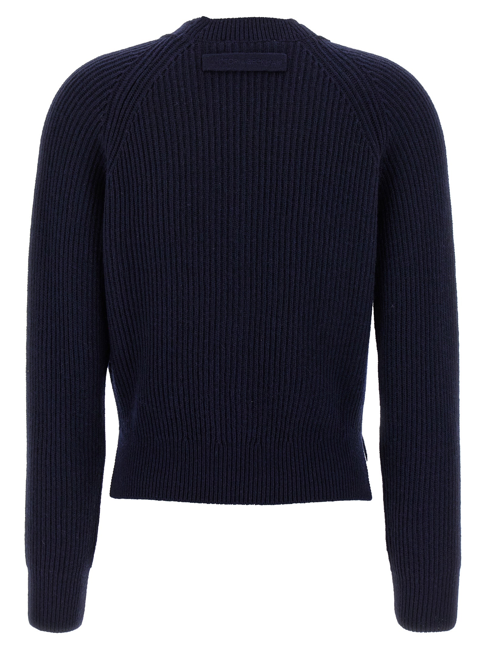 Elevate your wardrobe with the Victoria Beckham Blue Wool Cardigan, a luxurious cashmere blend piece that embodies timeless elegance and sophisticated style.