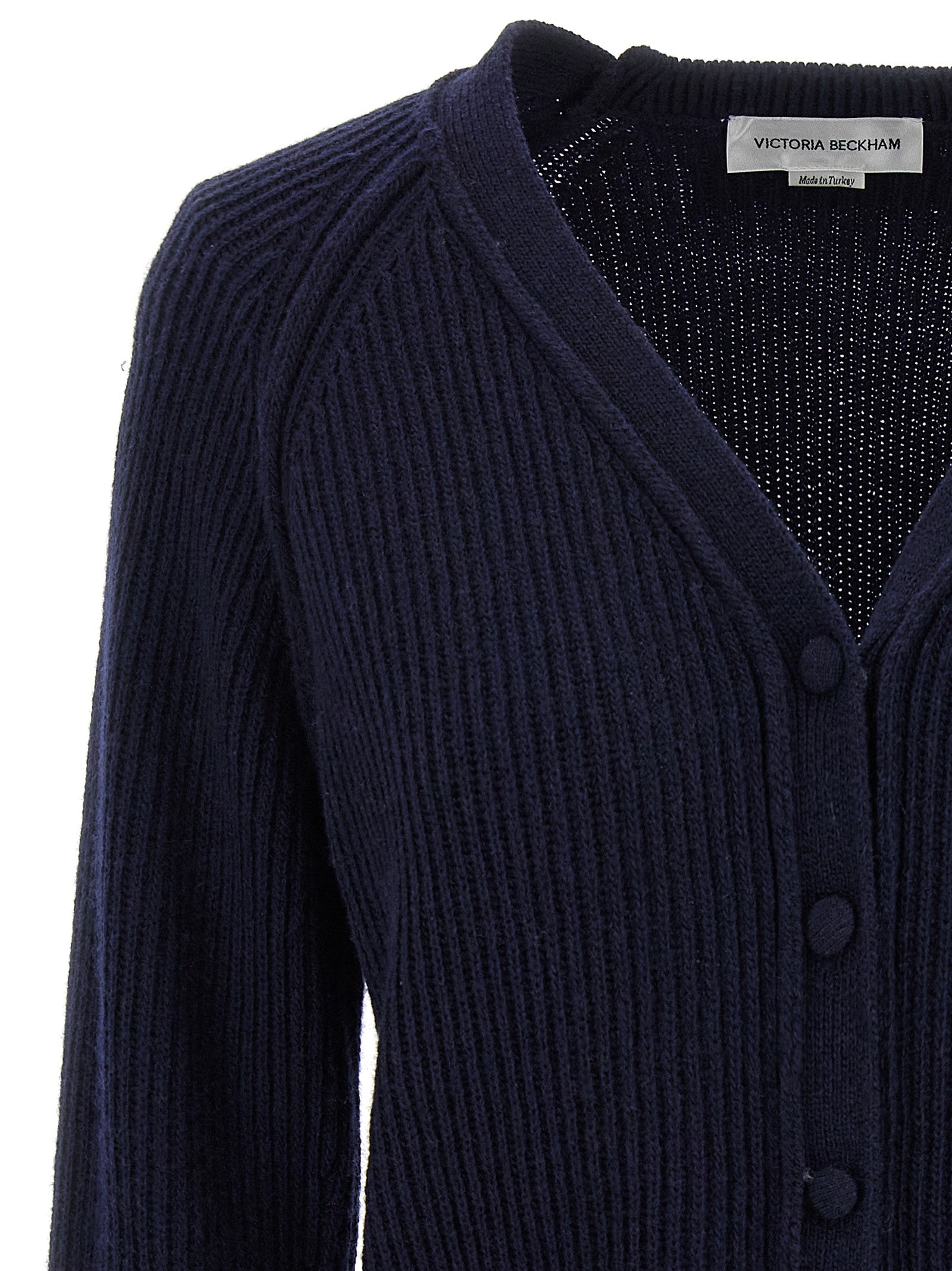 Elevate your wardrobe with the Victoria Beckham Blue Wool Cardigan, a luxurious cashmere blend piece that embodies timeless elegance and sophisticated style.
