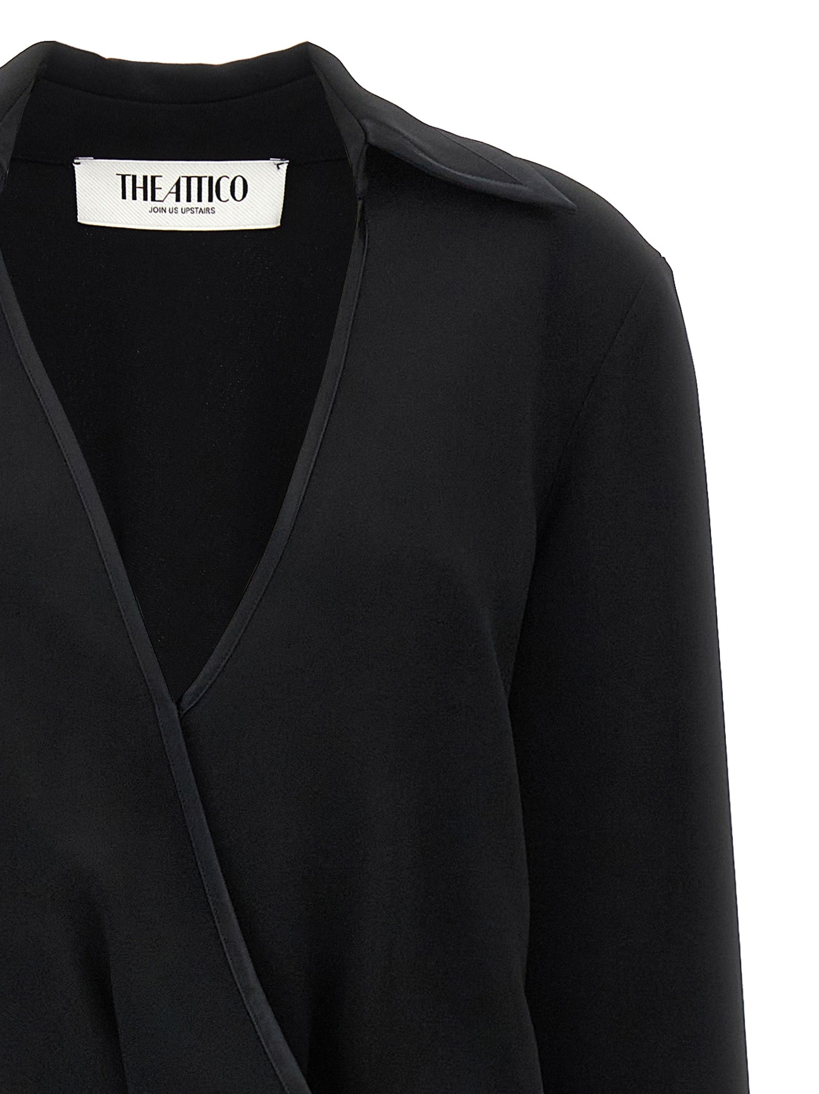 Indulge in the allure of The Attico Black Marabou Midi Dress, a masterpiece of structured elegance crafted from luxurious materials, perfect for the discerning fashion connoisseur.