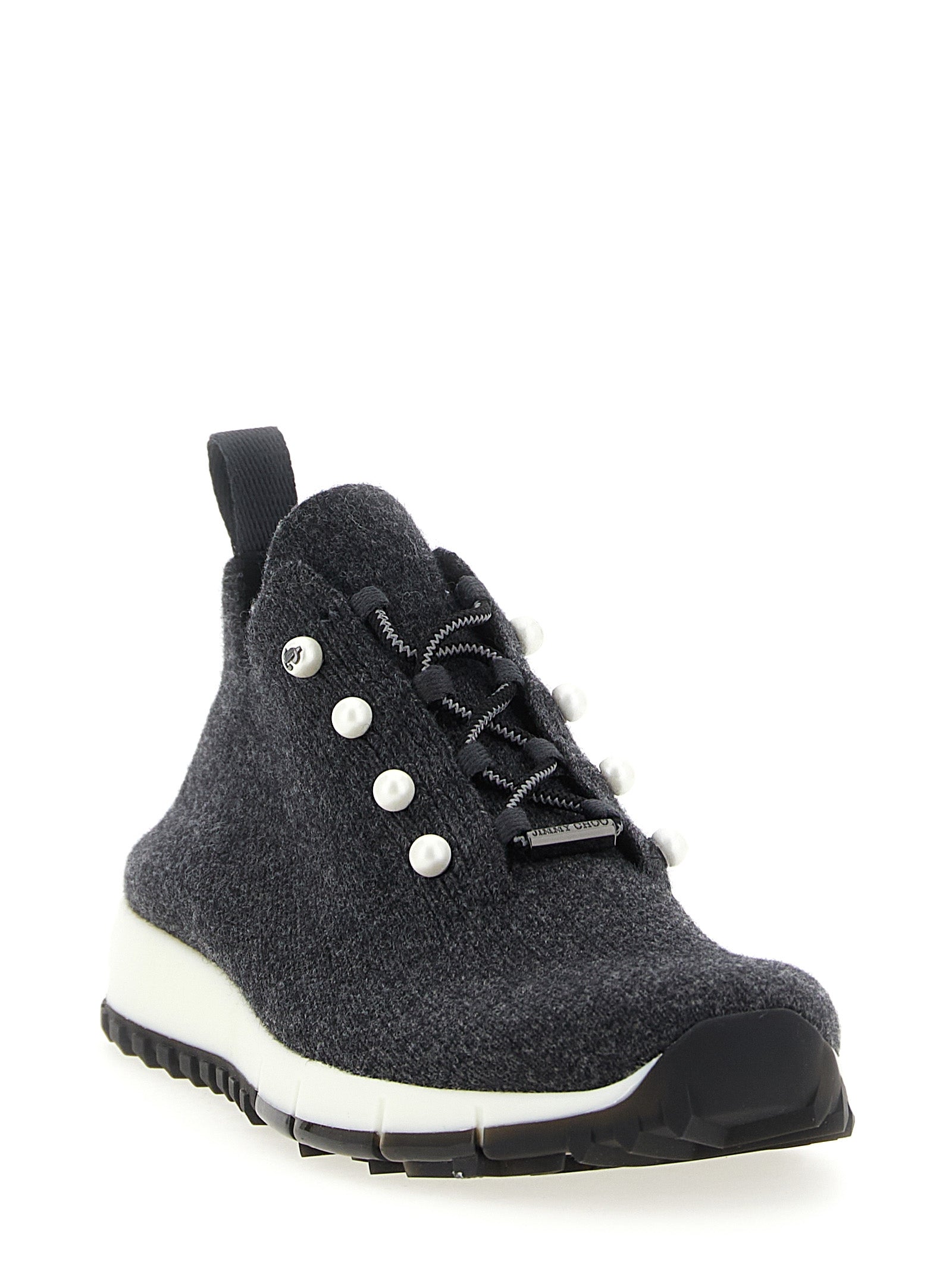 Step into unparalleled elegance with Jimmy Choo's Black Tencel Low Top Sneakers, where luxurious cashmere knit meets exquisite craftsmanship for a statement of sophistication.